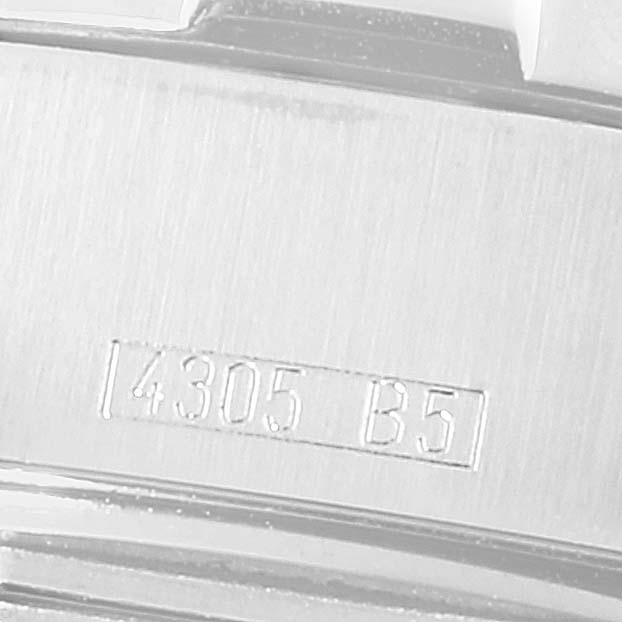 This image shows a close-up of the engraved model number "4305 B5" on the case of a Breitling Superocean A17390 Men
s Stainless Steel Black Dial A17390 Men
s Stainless Steel Black Dial watch.