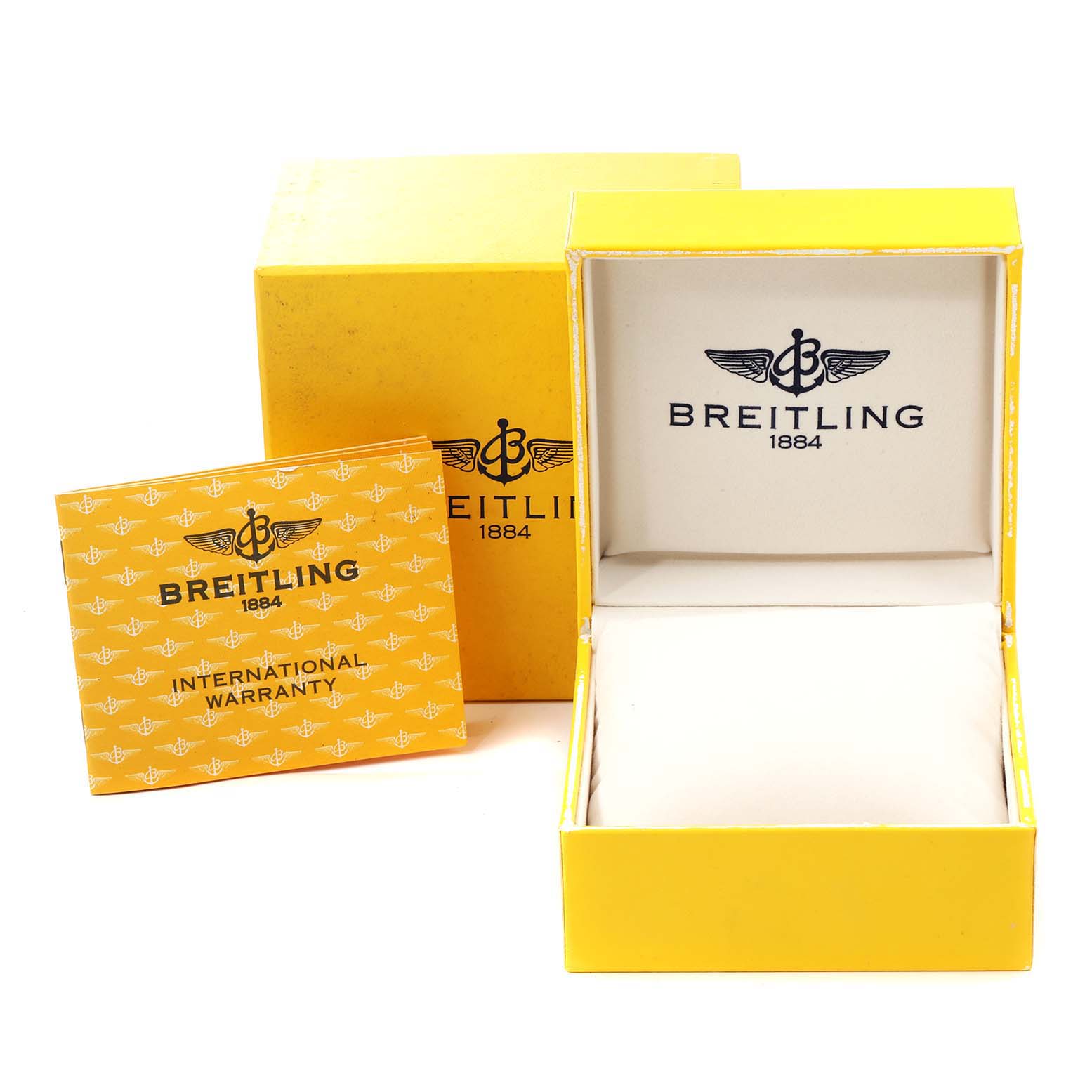 The image shows an open Breitling Superocean A17390 Men
s Stainless Steel Black Dial A17390 Men
s Stainless Steel Black Dial watch box and an international warranty card.