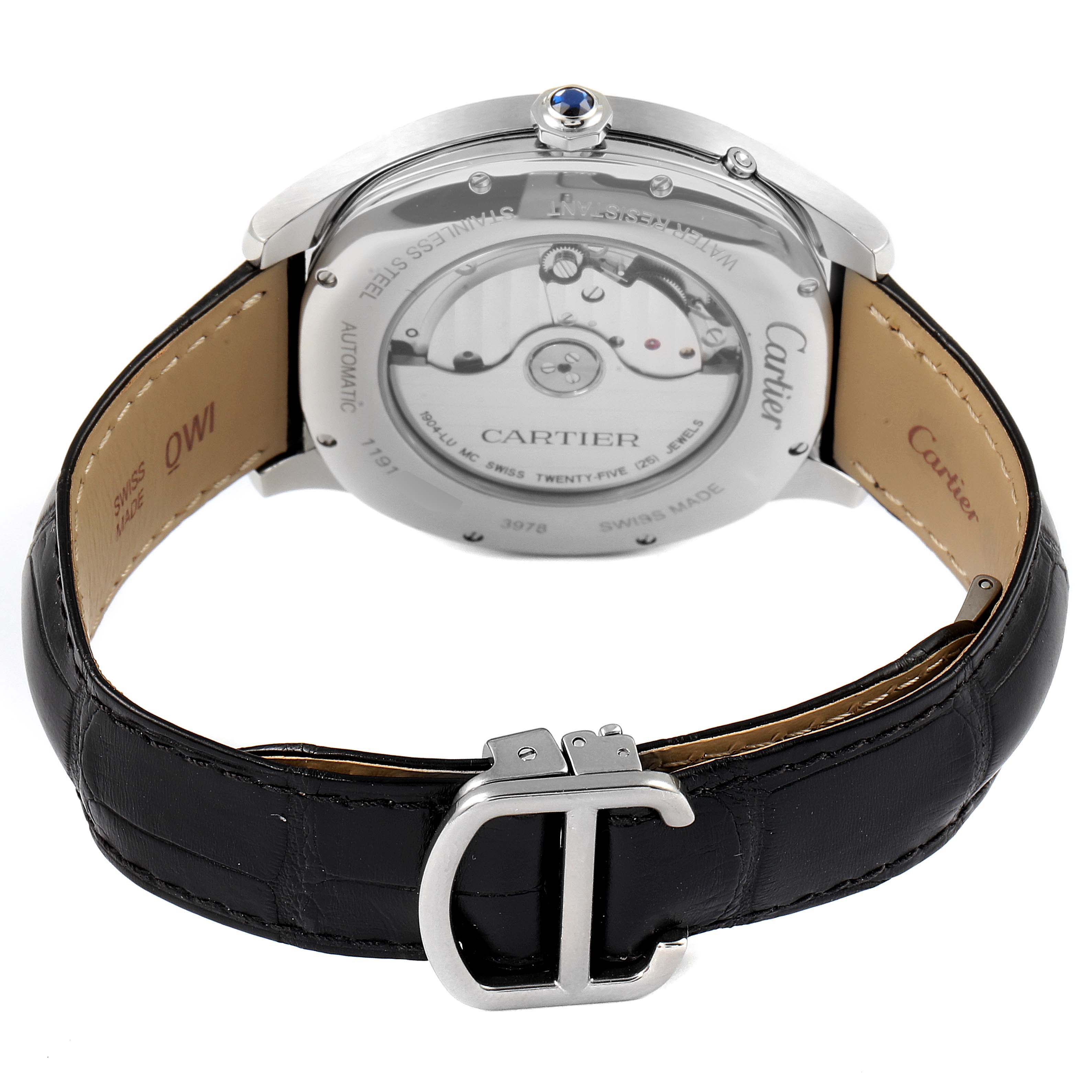 The image shows the back view of the Drive de Cartier watch by Cartier, highlighting the movement and black leather strap.