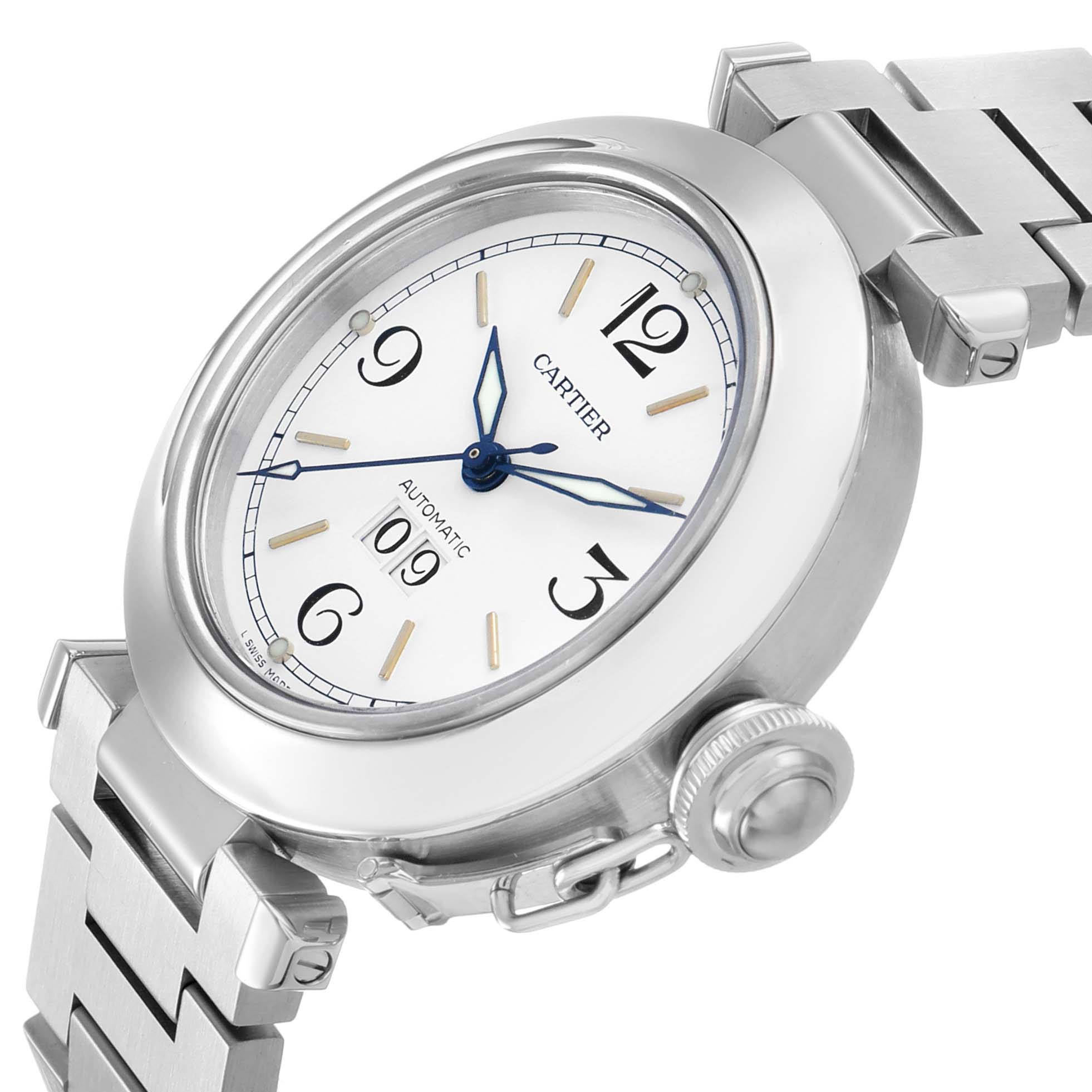 The Cartier Pasha W31044M7 Men's Stainless Steel White Dial watch is shown from an oblique angle highlighting the white dial, blue hands, numerals, crown, and metal bracelet.