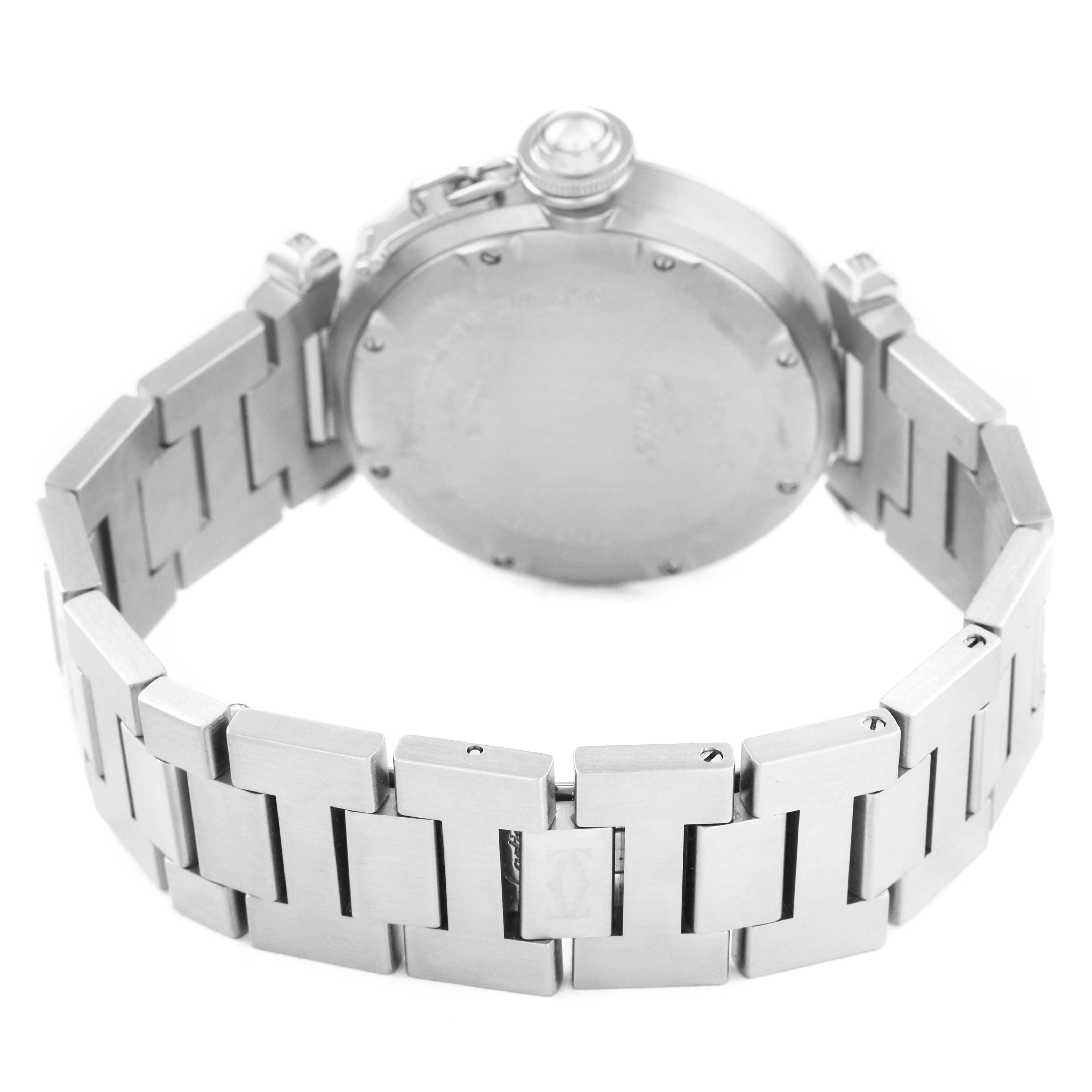 The image shows the back and bracelet of the Cartier Pasha W31044M7 Men's Stainless Steel White Dial watch, focusing on the stainless steel links and case back.
