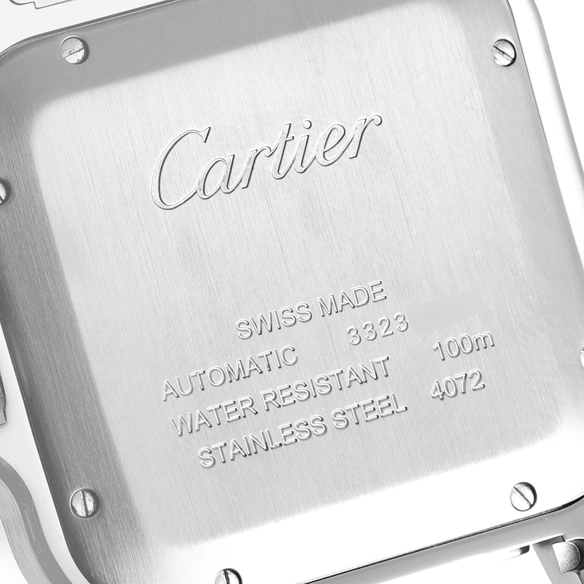 This image shows the back of a Cartier Santos W2SA0009 Men's Steel and Gold (two tone) Silver Dial W2SA0009 Men's Steel and Gold (two tone) Silver Dial watch, highlighting the engraved specifications.