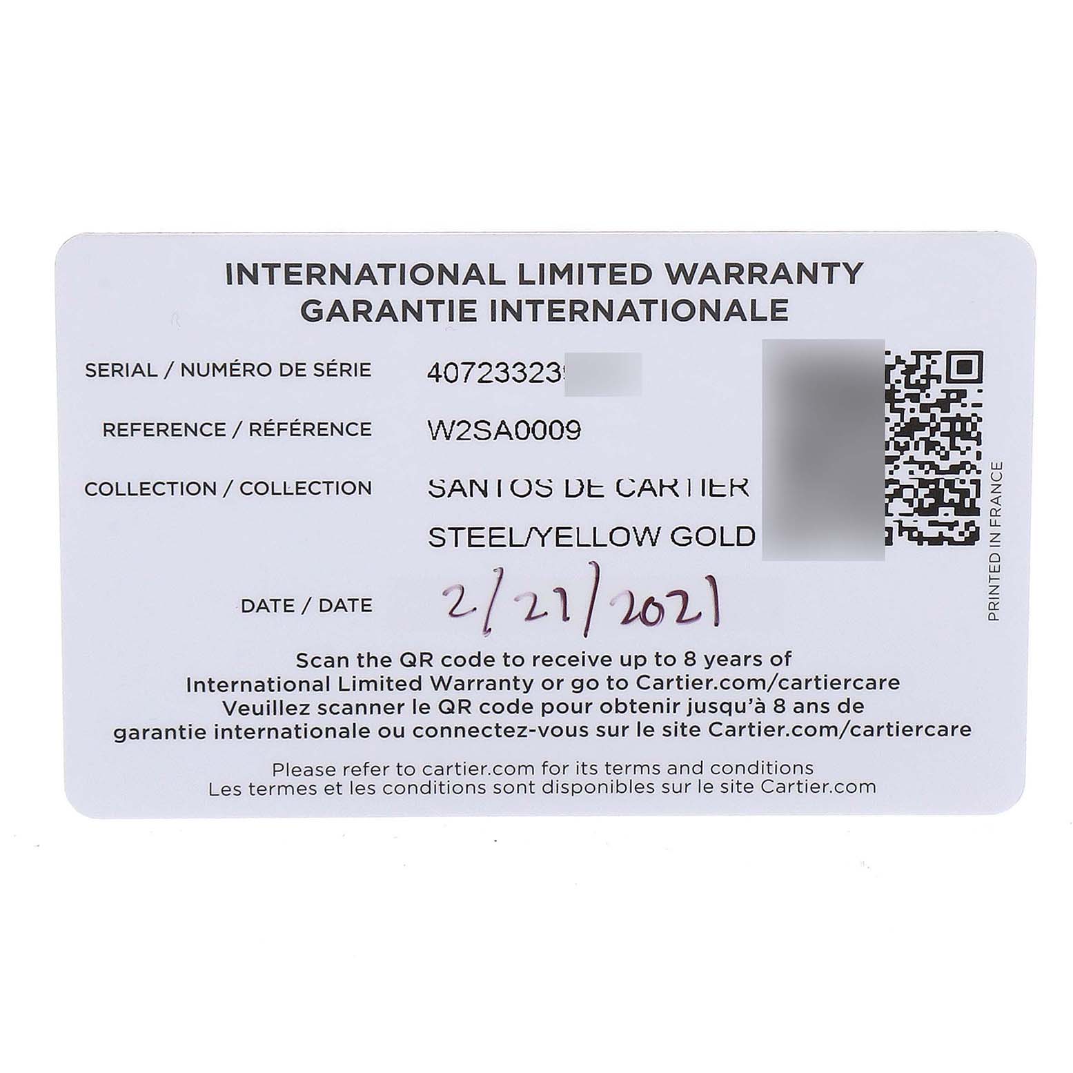 This image shows the international limited warranty card for the Santos de Cartier watch, indicating a steel/yellow gold model.