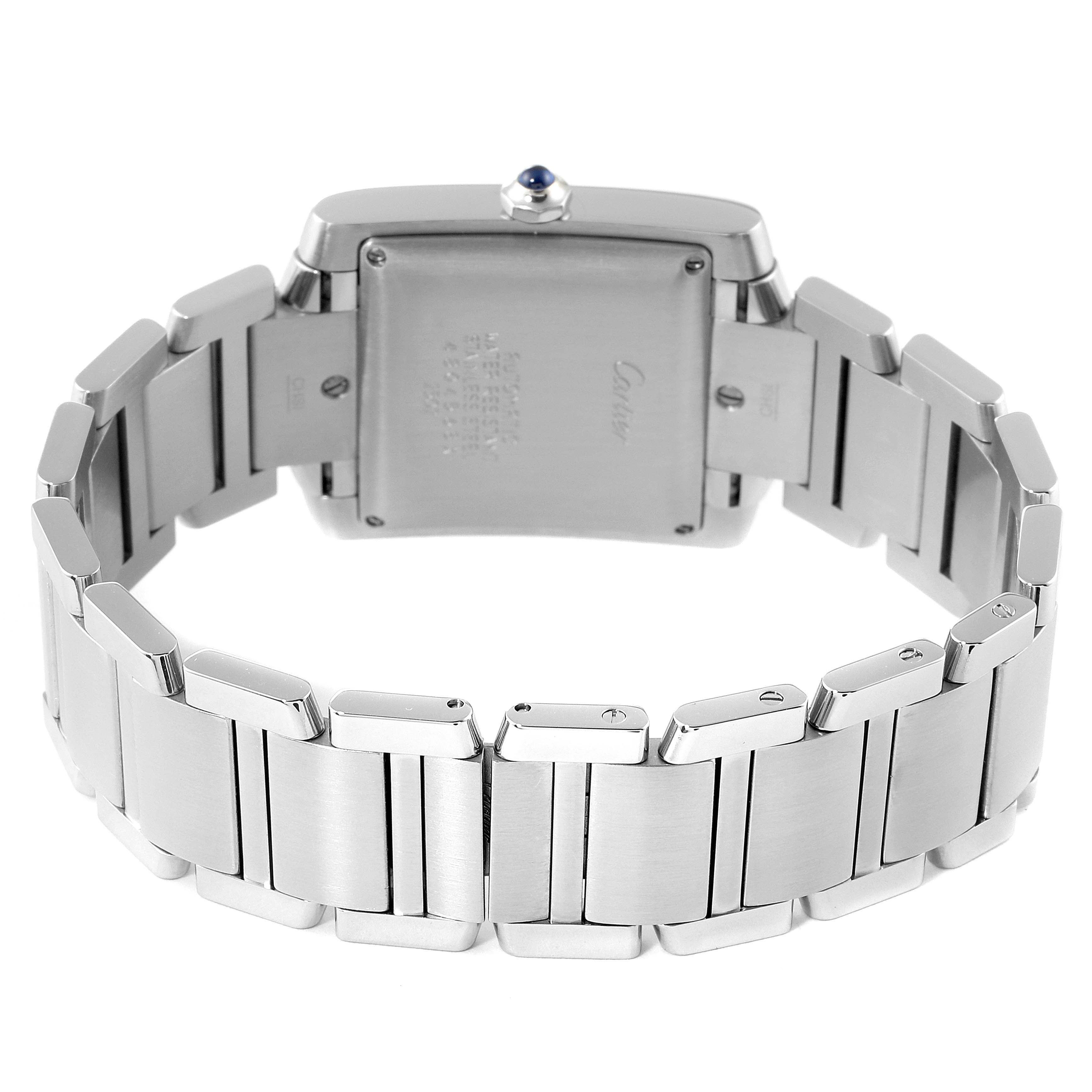 The image shows the back casing and metal bracelet of a Cartier Tank Francaise W51002Q3 Men's Stainless Steel Silver Dial W51002Q3 Men's Stainless Steel Silver Dial watch from a rear angle.