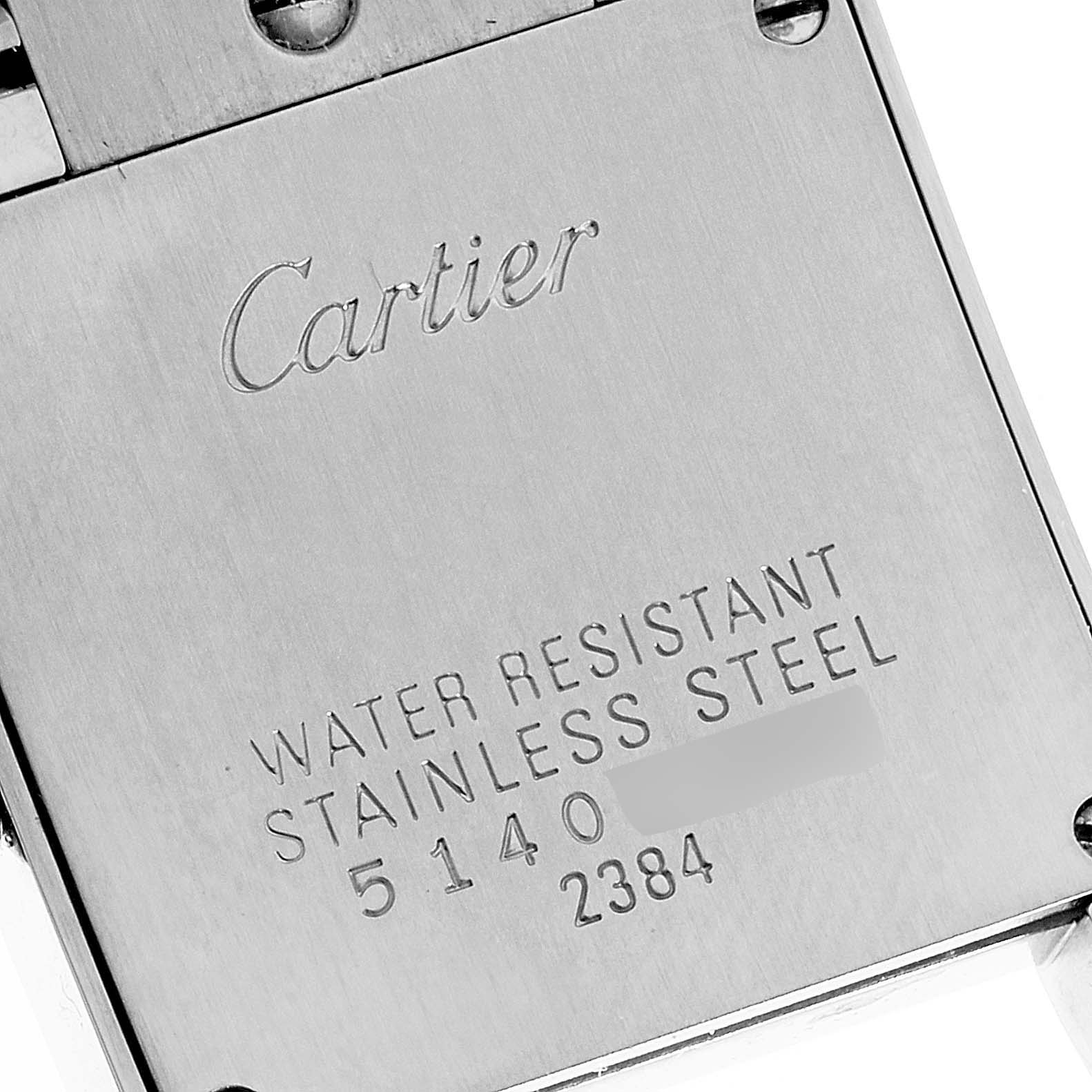 This image shows the backside of a Cartier Tank Francaise W51028Q3 Women
s Stainless Steel Mother of Pearl Dial W51028Q3 Women
s Stainless Steel Mother of Pearl Dial watch, highlighting its branding and material details.