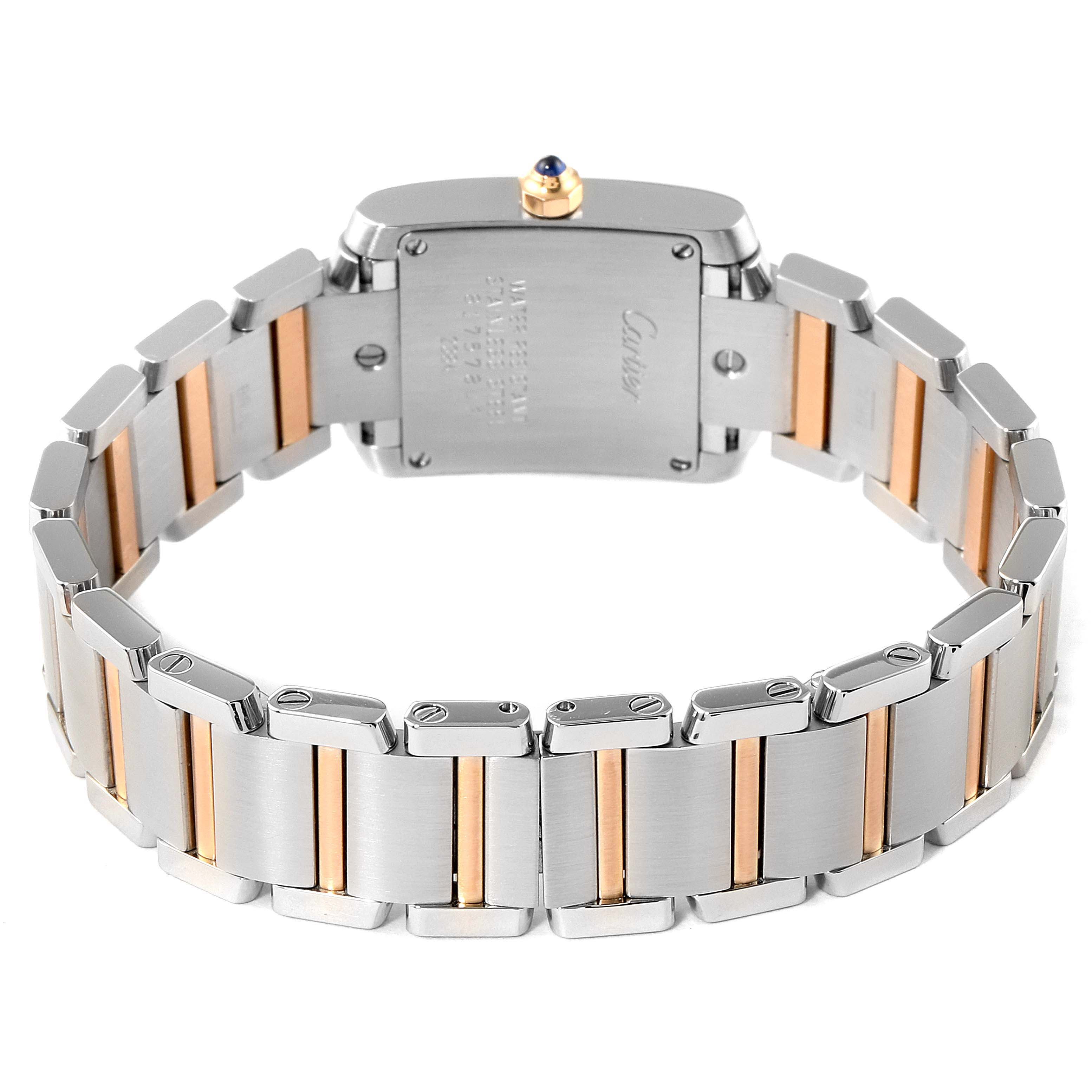 This image shows the back view of a Cartier Tank Française watch, focusing on the case and two-tone metal bracelet.