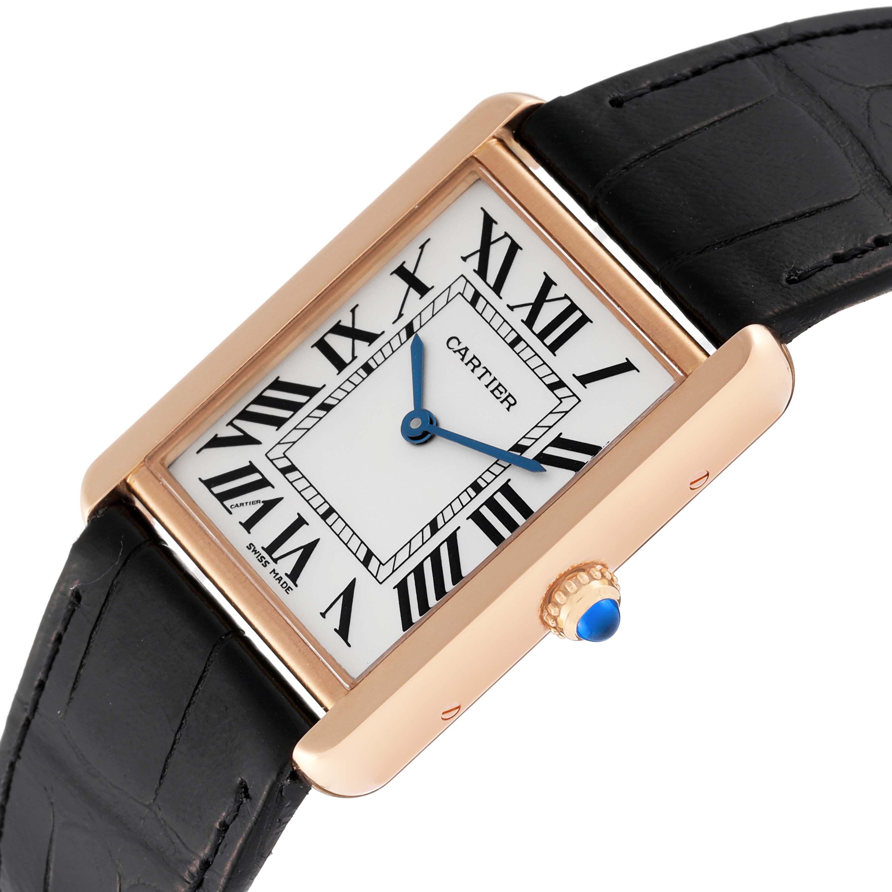 The Cartier Tank Solo W5200025 Men's Steel and Gold (two tone) Silver Dial W5200025 Men's Steel and Gold (two tone) Silver Dial watch is shown at a slight side angle, highlighting its rectangular face, black leather strap, and blue cabochon crown.