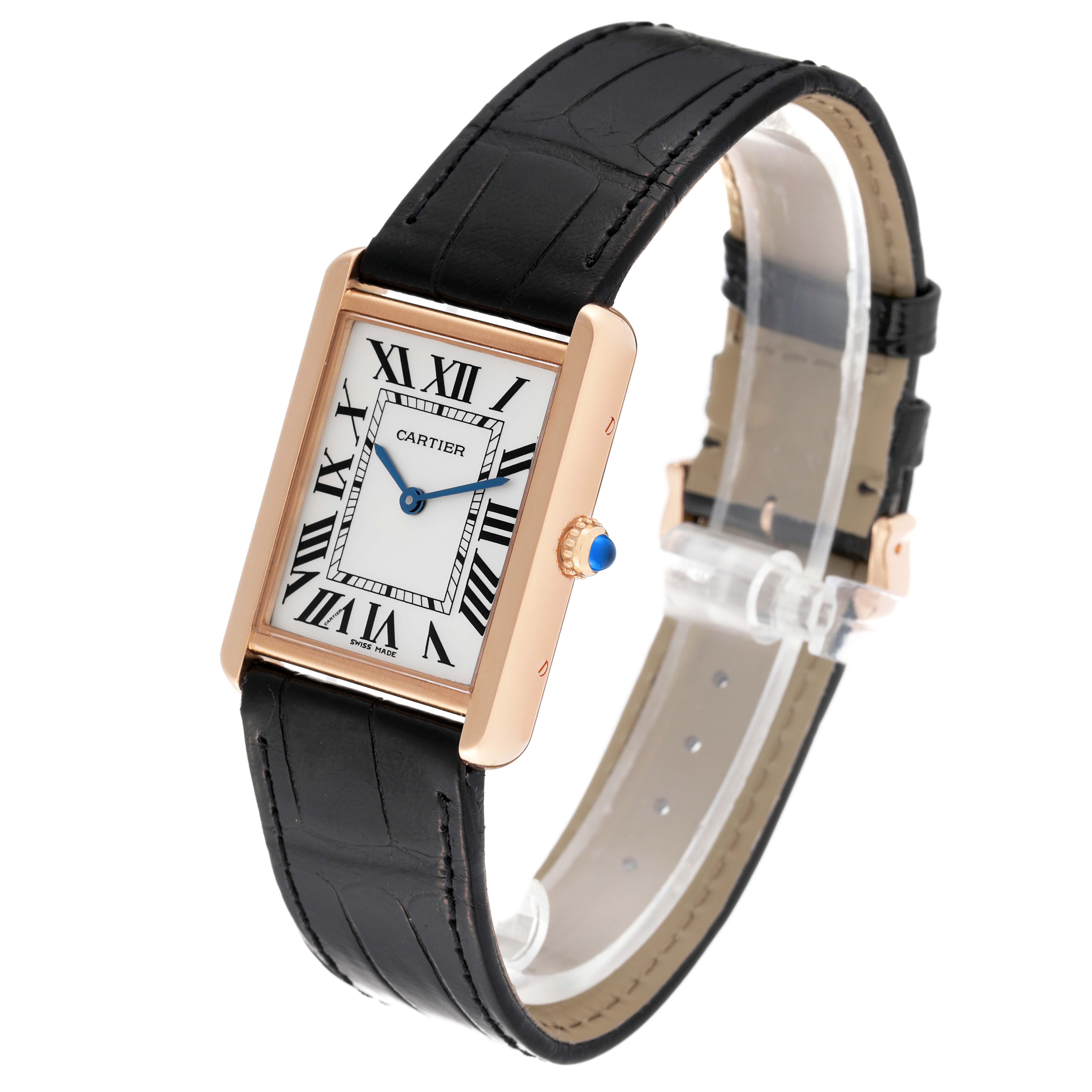 The Cartier Tank Solo W5200025 Men's Steel and Gold (two tone) Silver Dial W5200025 Men's Steel and Gold (two tone) Silver Dial watch is shown at an angle highlighting its rectangular face, black strap, and blue cabochon crown.