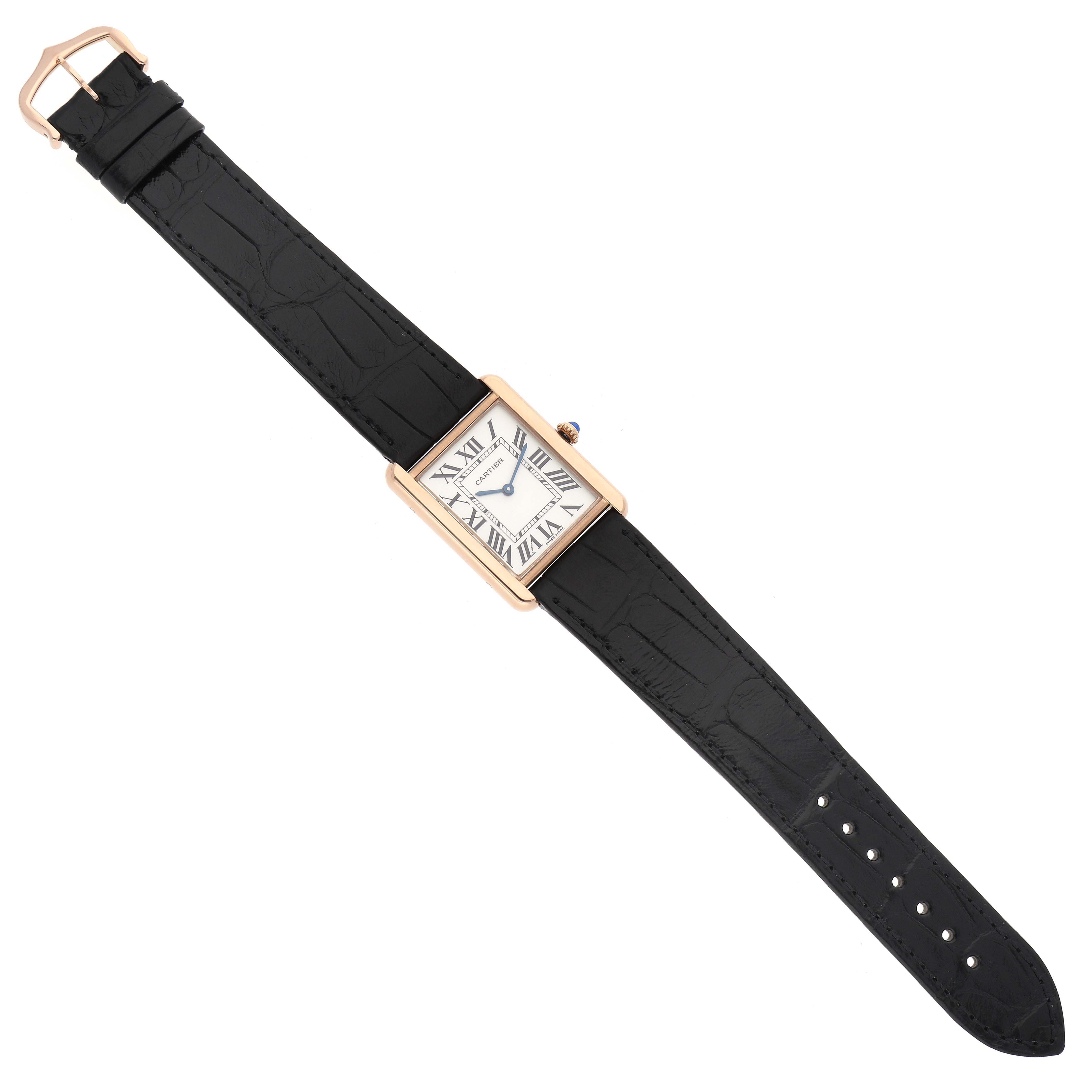 The image displays a top-down view of a Cartier Tank Solo W5200025 Men's Steel and Gold (two tone) Silver Dial W5200025 Men's Steel and Gold (two tone) Silver Dial watch, featuring a rectangular face and black leather strap.