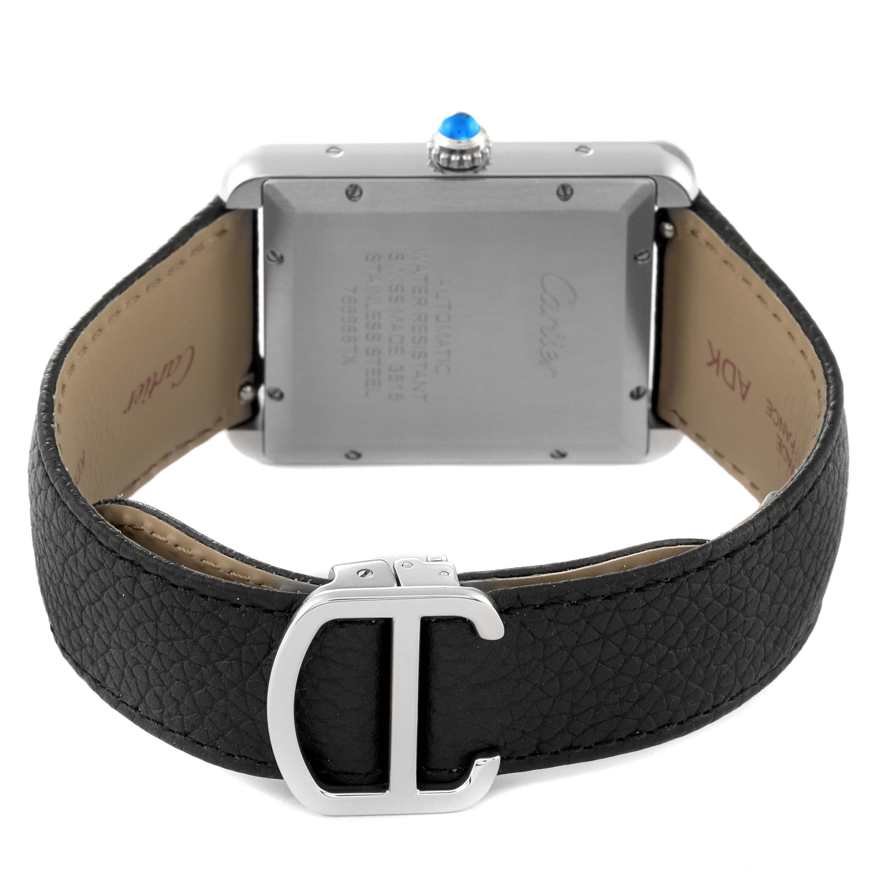 The image shows the back view of a Cartier Tank Solo W5200027 Men's Stainless Steel Silver Dial W5200027 Men's Stainless Steel Silver Dial watch, including its case back, crown with a blue cabochon, and leather strap with a buckle.