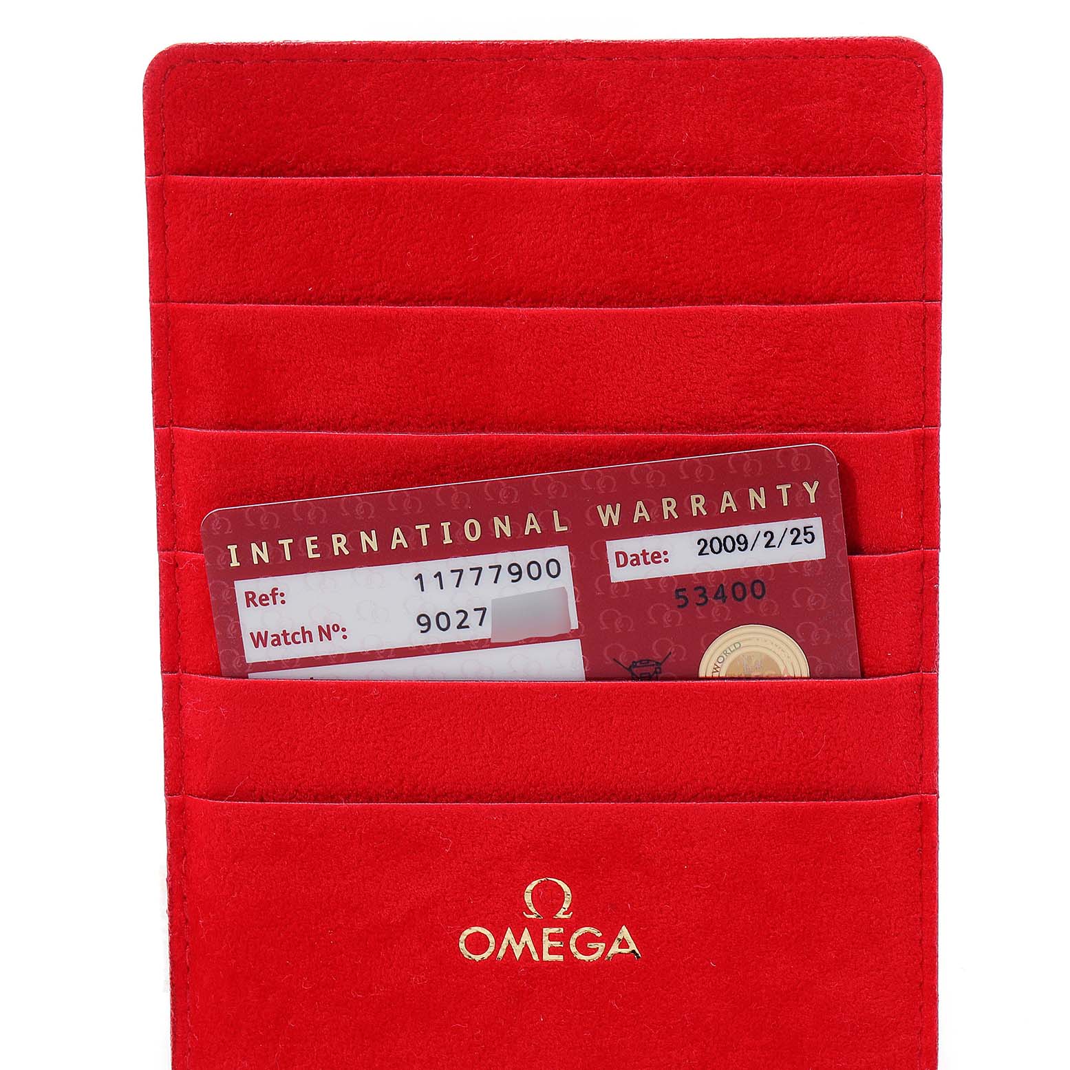 The image shows a red Omega 1177.79.00 Women's White Gold Mother of Pearl Dial 1177.79.00 Women's White Gold Mother of Pearl Dial cardholder with the international warranty card for the Omega 1177.79.00 Women's White Gold Mother of Pearl Dial 1177.79.00 Women's White Gold Mother of Pearl Dial Constellation Iris Yellow Gold Multi Stone Watch, model 1177.79.00.