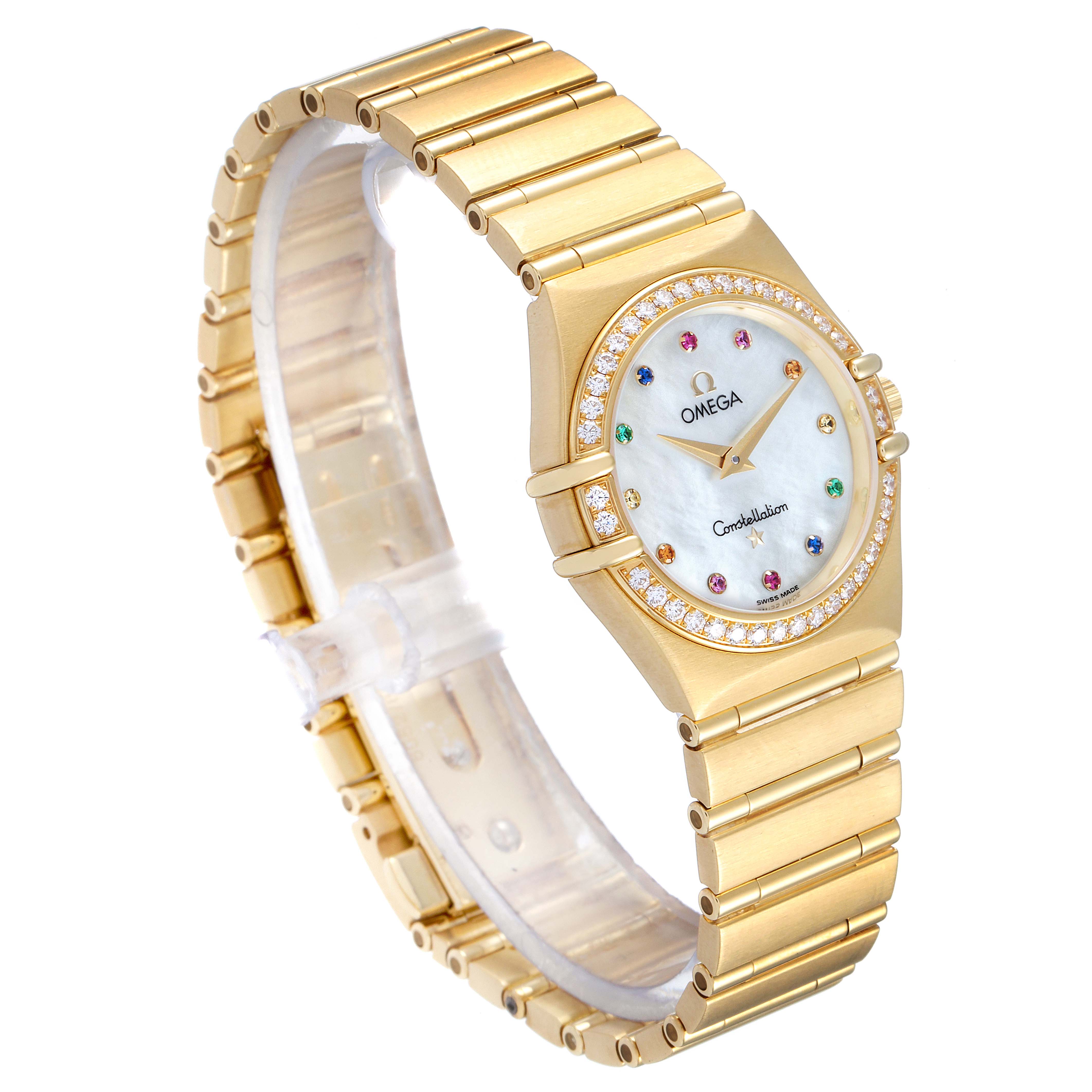 The Omega 1177.79.00 Women's White Gold Mother of Pearl Dial 1177.79.00 Women's White Gold Mother of Pearl Dial Constellation Iris Yellow Gold Multi Stone Watch 1177.79.00 is shown at a three-quarter angle, highlighting its face, bezel, and bracelet.