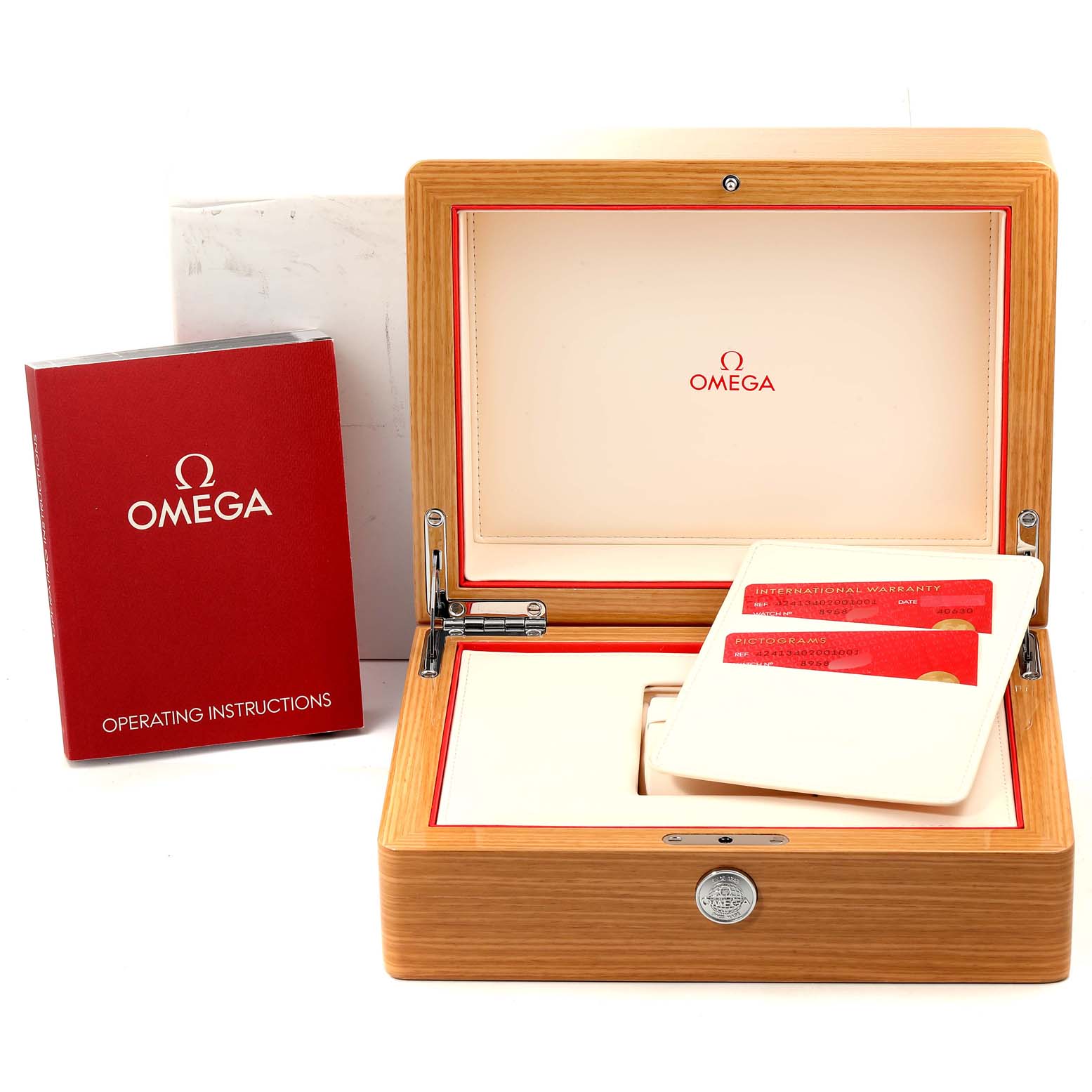 The image shows the packaging and accessories for the Omega De Ville 424.13.40.20.01.001 Men's Stainless Steel Black Dial 424.13.40.20.01.001 Men's Stainless Steel Black Dial watch, including the wooden box, operating instructions, and warranty cards.