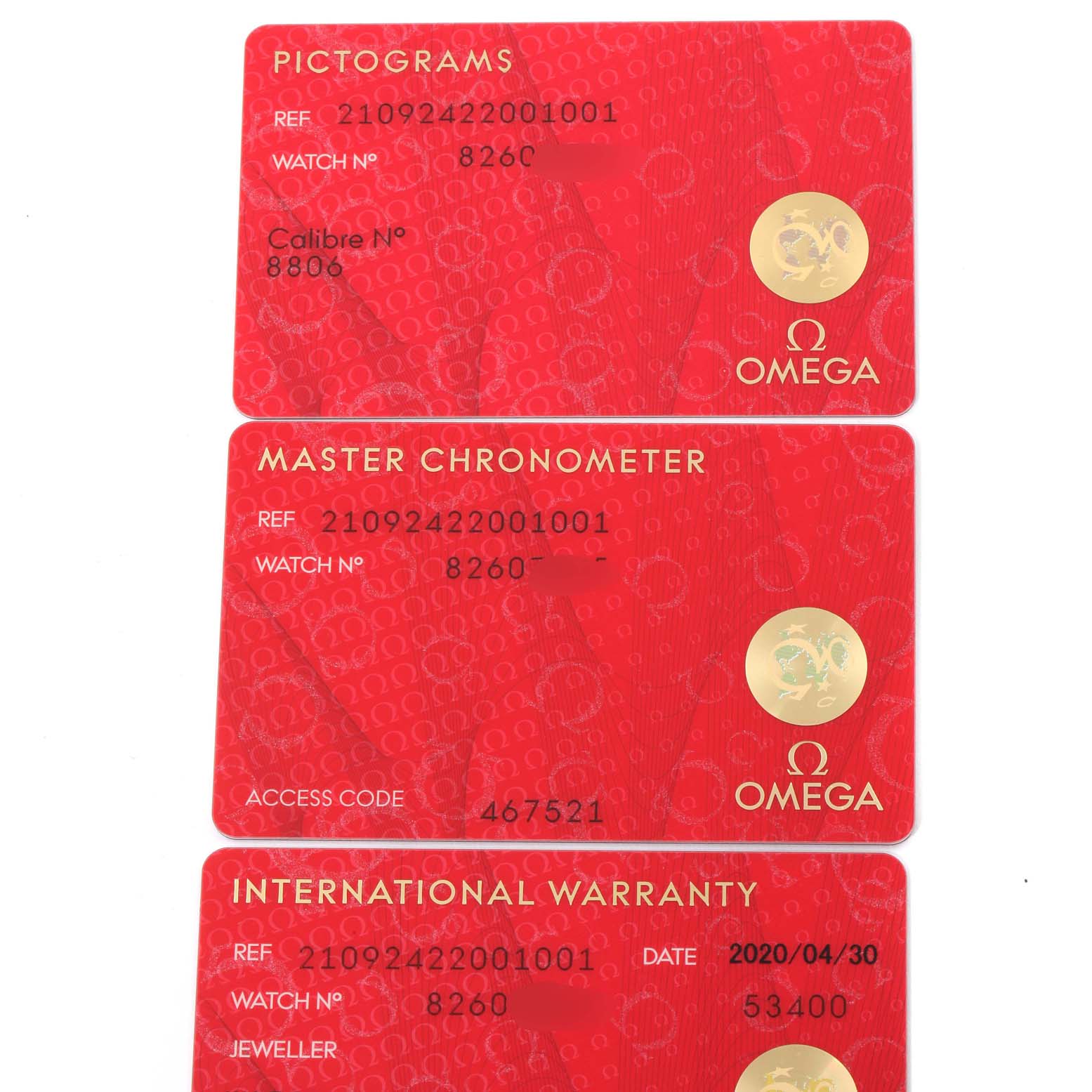 This image shows the pictograms card, master chronometer card, and international warranty card for the Omega Seamaster 210.92.42.20.01.001 Men's Titanium Brown Dial 210.92.42.20.01.001 Men's Titanium Brown Dial model.