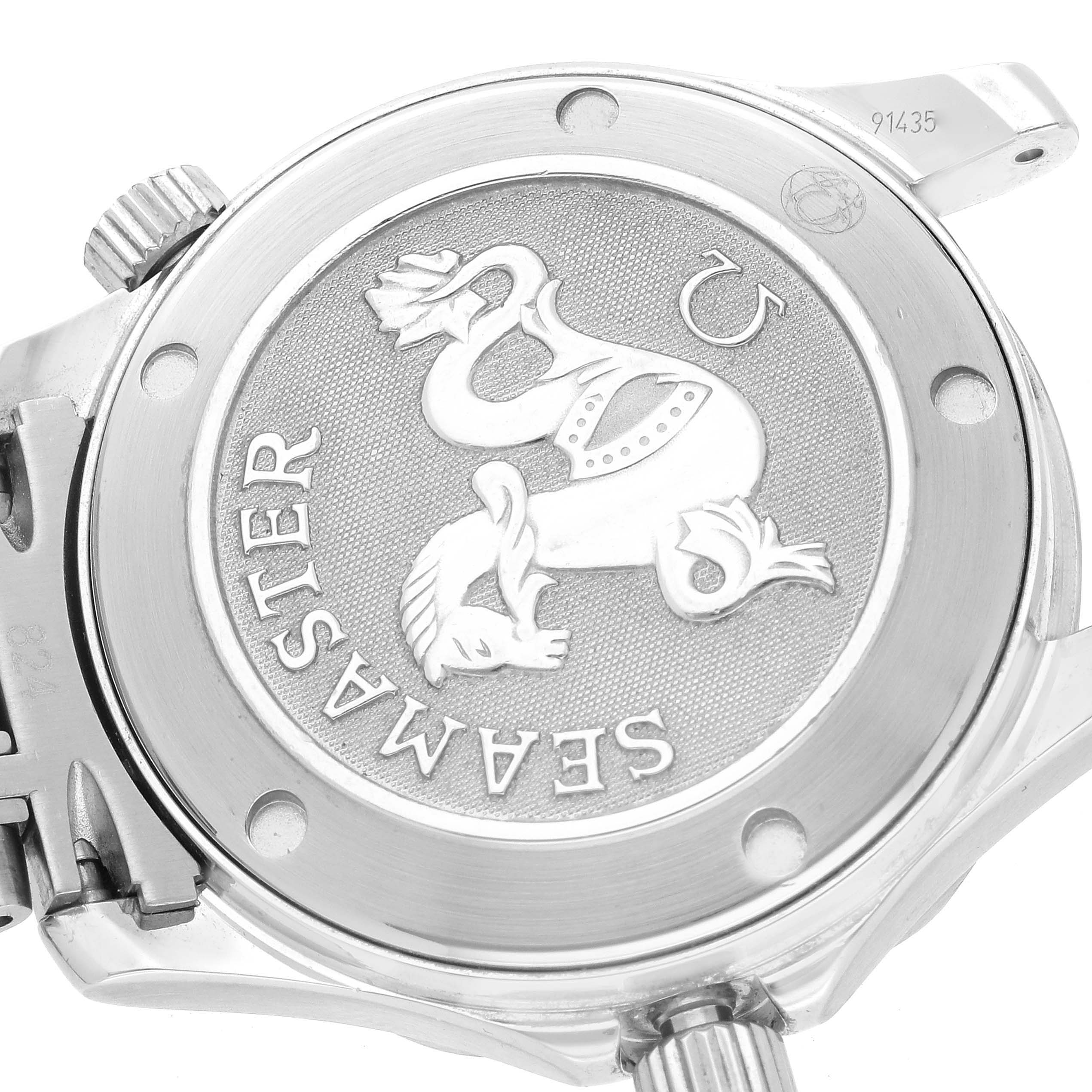 This image shows the engraved back case of the Omega Seamaster 2223.80.00 Men
s Stainless Steel Blue Dial 2223.80.00 Men
s Stainless Steel Blue Dial watch from an angle that highlights the crown and caseback details.