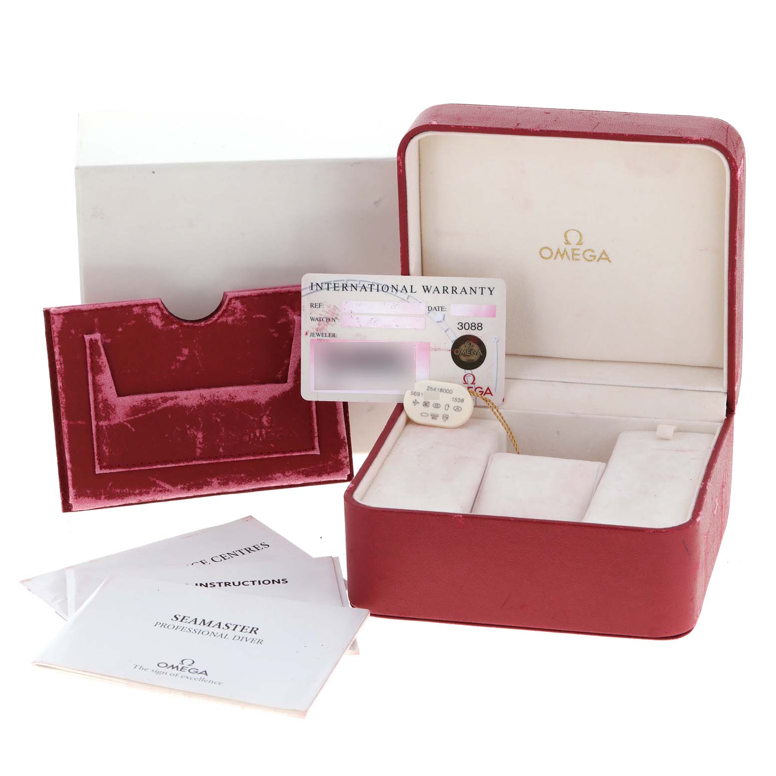 The image shows an Omega Seamaster 2541.80.00 Men
s Stainless Steel Blue Dial 2541.80.00 Men
s Stainless Steel Blue Dial watch box, warranty card, manual, and case from a high-angle view.