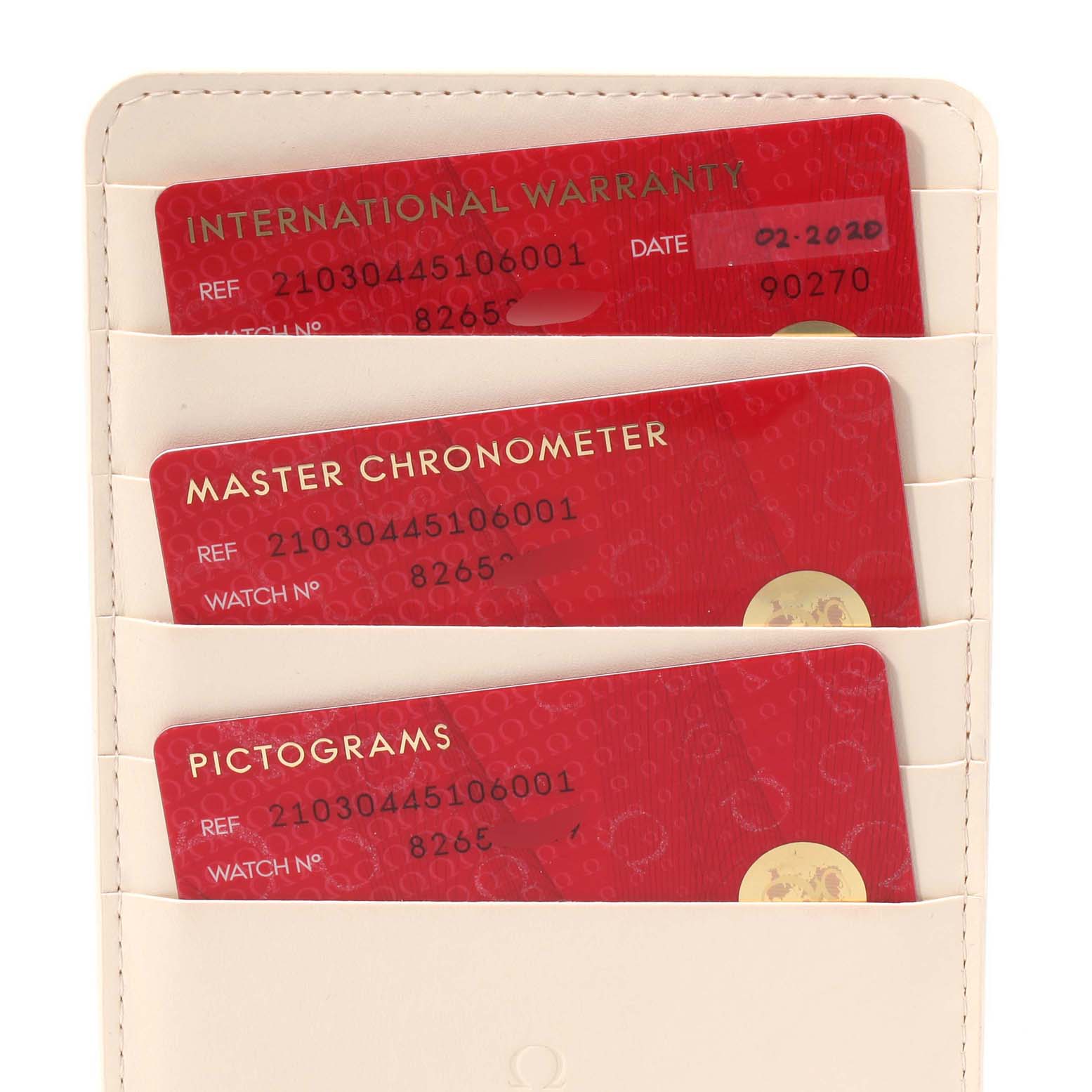 The image shows the international warranty, master chronometer, and pictograms cards for the Omega Seamaster 210.30.44.51.06.001 Men
s Stainless Steel Grey Dial 210.30.44.51.06.001 Men
s Stainless Steel Grey Dial watch.