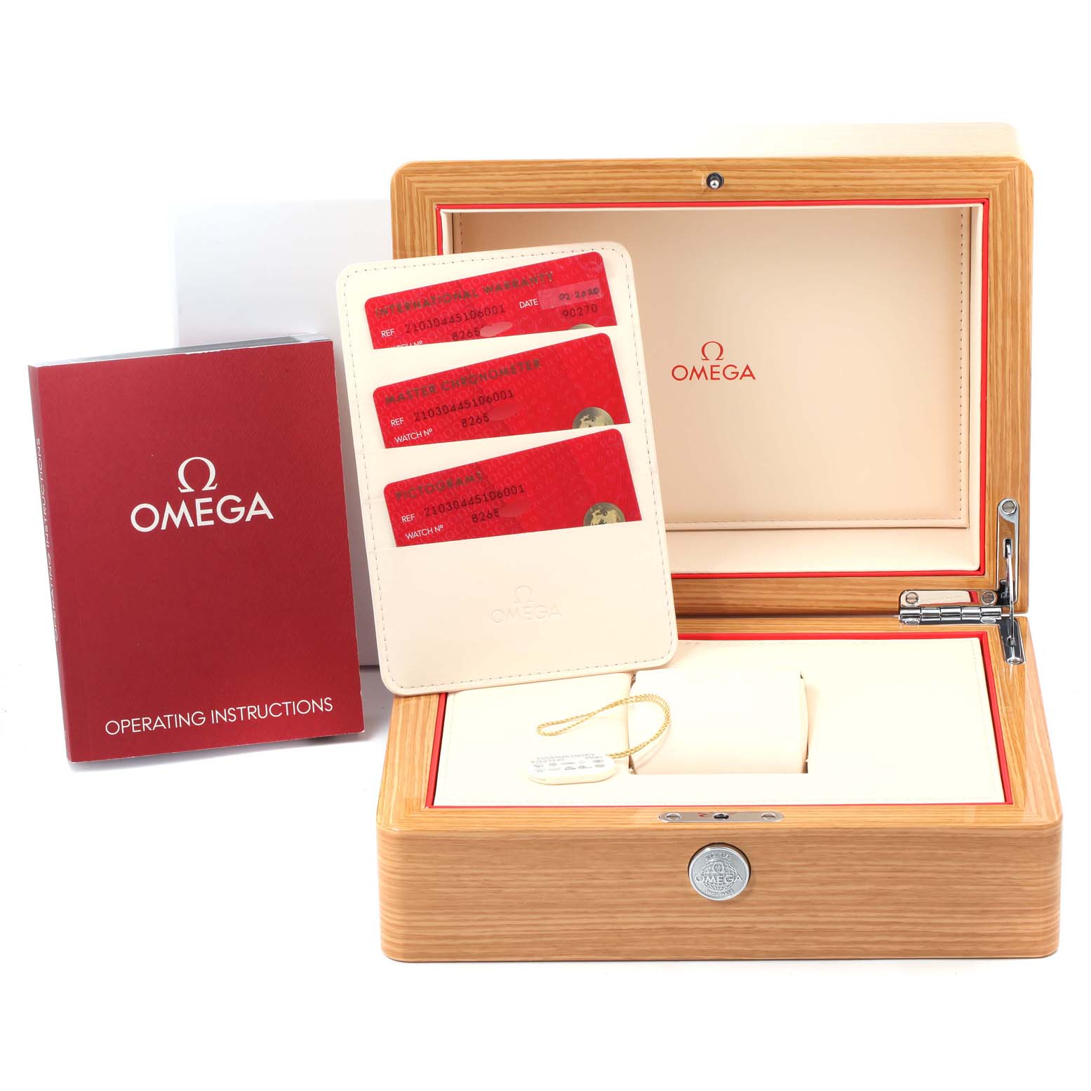 The image shows the opened wooden box of an Omega Seamaster 210.30.44.51.06.001 Men
s Stainless Steel Grey Dial 210.30.44.51.06.001 Men
s Stainless Steel Grey Dial, along with operating instructions and identification cards.