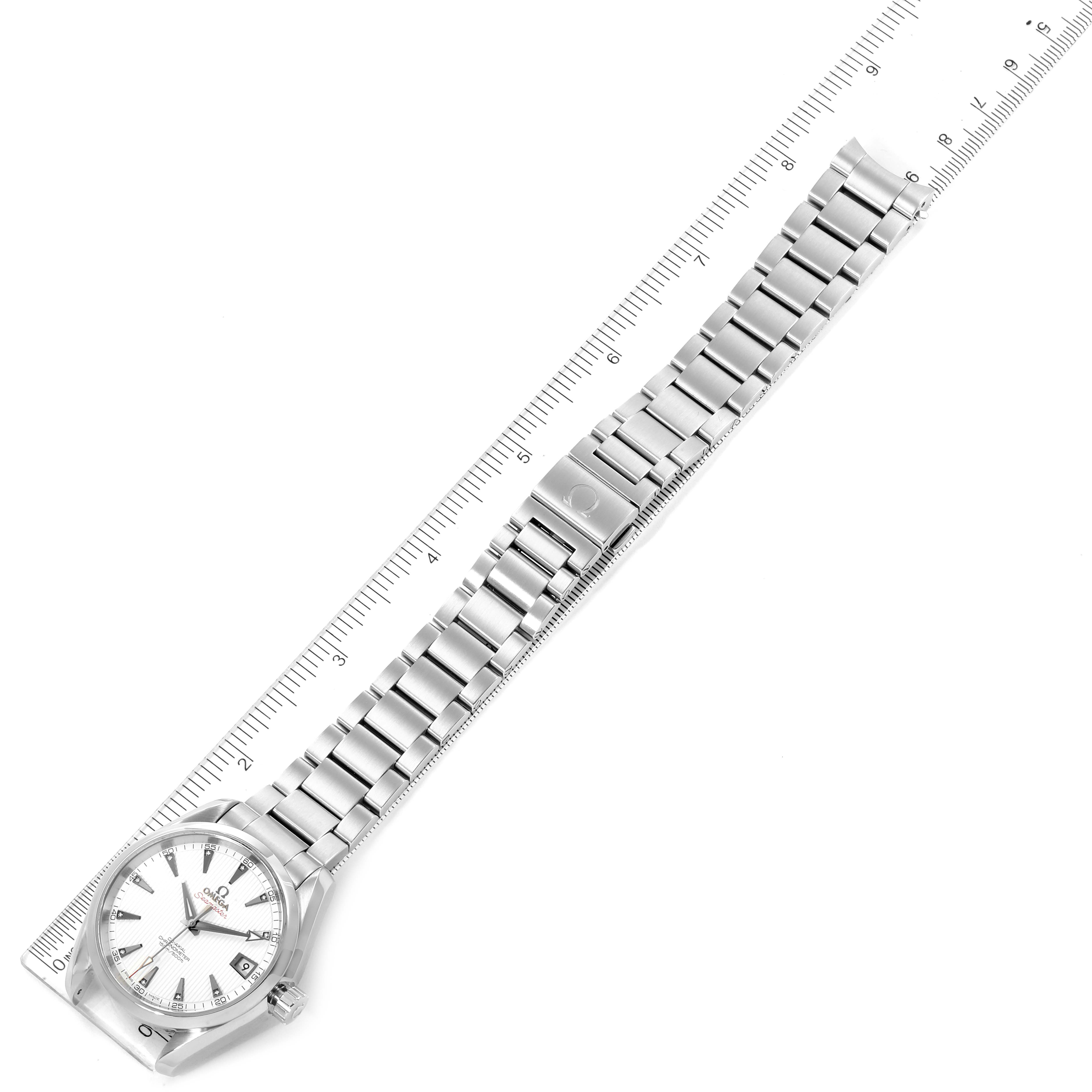 The image shows the Omega Aqua Terra 231.10.39.21.54.001 Men
s Stainless Steel White Dial 231.10.39.21.54.001 Men
s Stainless Steel White Dial watch laid flat with its full metal bracelet next to a ruler for scale.