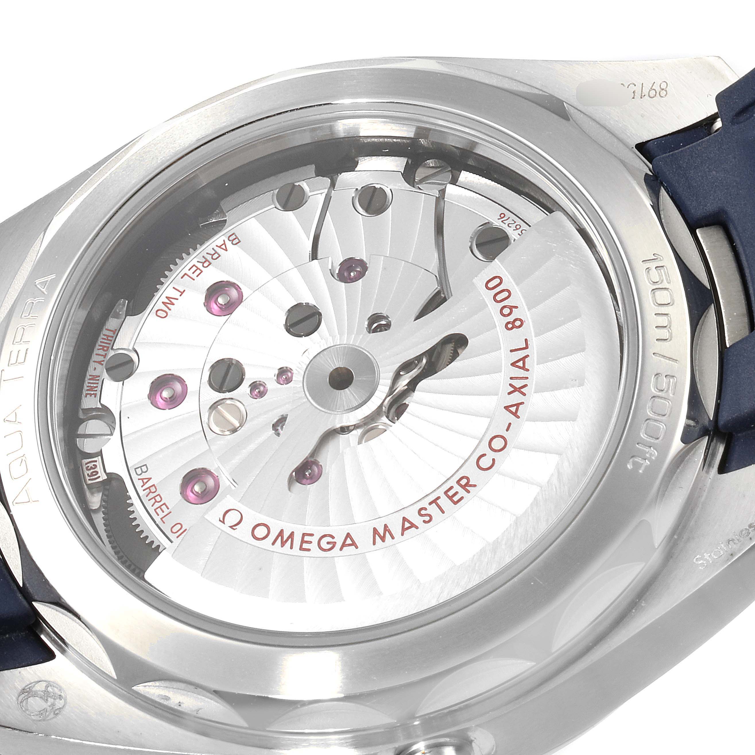 The image shows the back view of the Omega Aqua Terra 220.12.41.21.03.001 Men
s Stainless Steel Blue Dial 220.12.41.21.03.001 Men
s Stainless Steel Blue Dial watch, highlighting the inner workings and "Omega Master Co-Axial 8900" inscription.