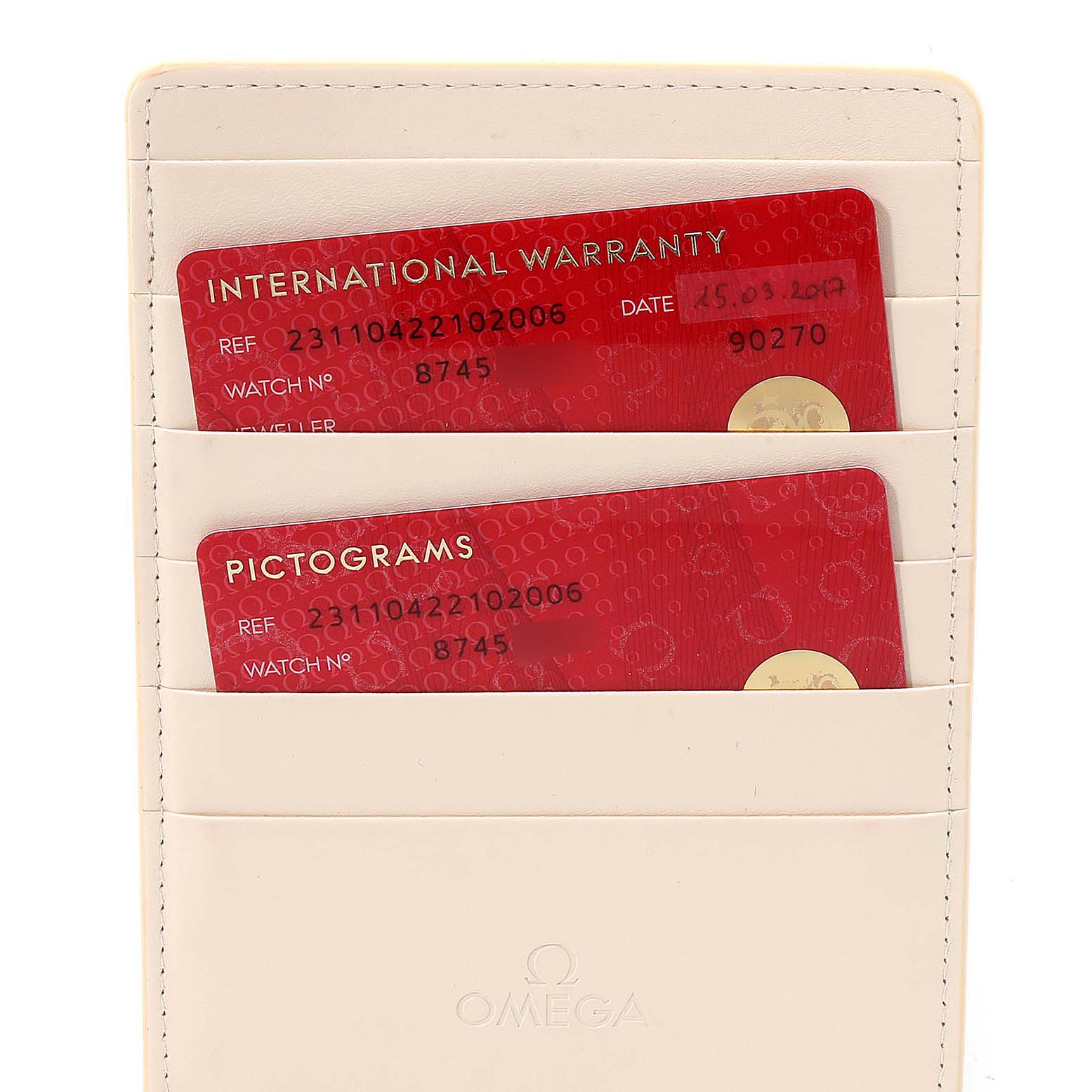 The image shows international warranty and pictogram cards for the Omega Aqua Terra 231.10.42.21.02.006 Men
s Stainless Steel Silver Dial 231.10.42.21.02.006 Men
s Stainless Steel Silver Dial model inside a cardholder.
