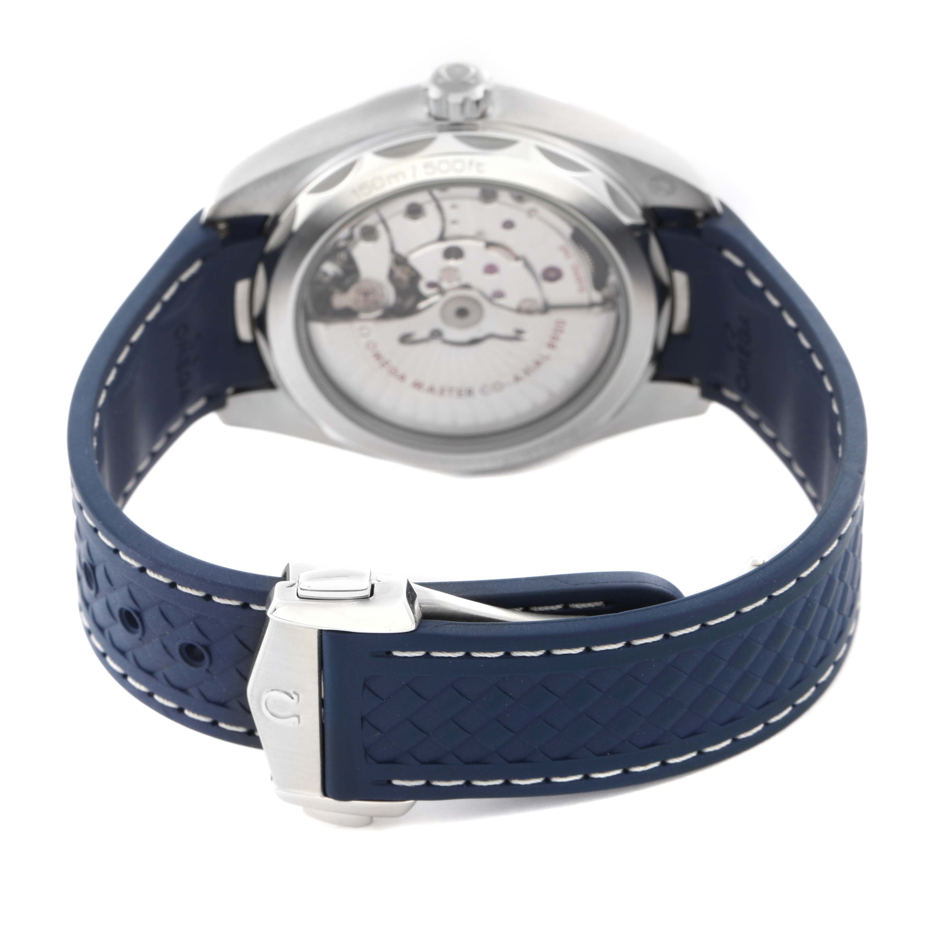 The image shows the Omega Aqua Terra 220.12.41.21.06.001 Men
s Stainless Steel Grey Dial 220.12.41.21.06.001 Men
s Stainless Steel Grey Dial watch from a rear angle, highlighting the transparent case back and blue textured strap.