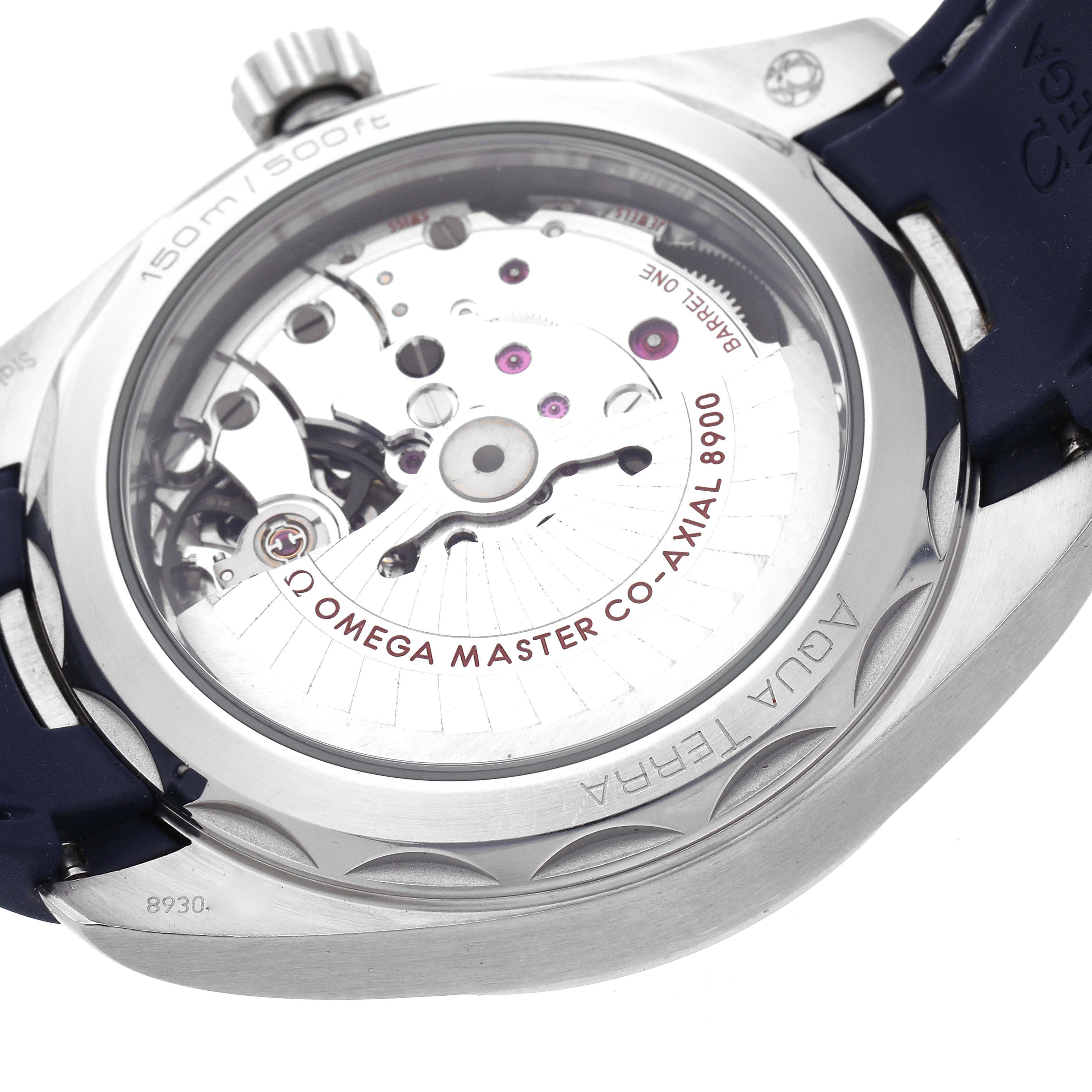 The image shows the back of an Omega Aqua Terra 220.12.41.21.06.001 Men
s Stainless Steel Grey Dial 220.12.41.21.06.001 Men
s Stainless Steel Grey Dial watch, highlighting its movement and transparent case back.
