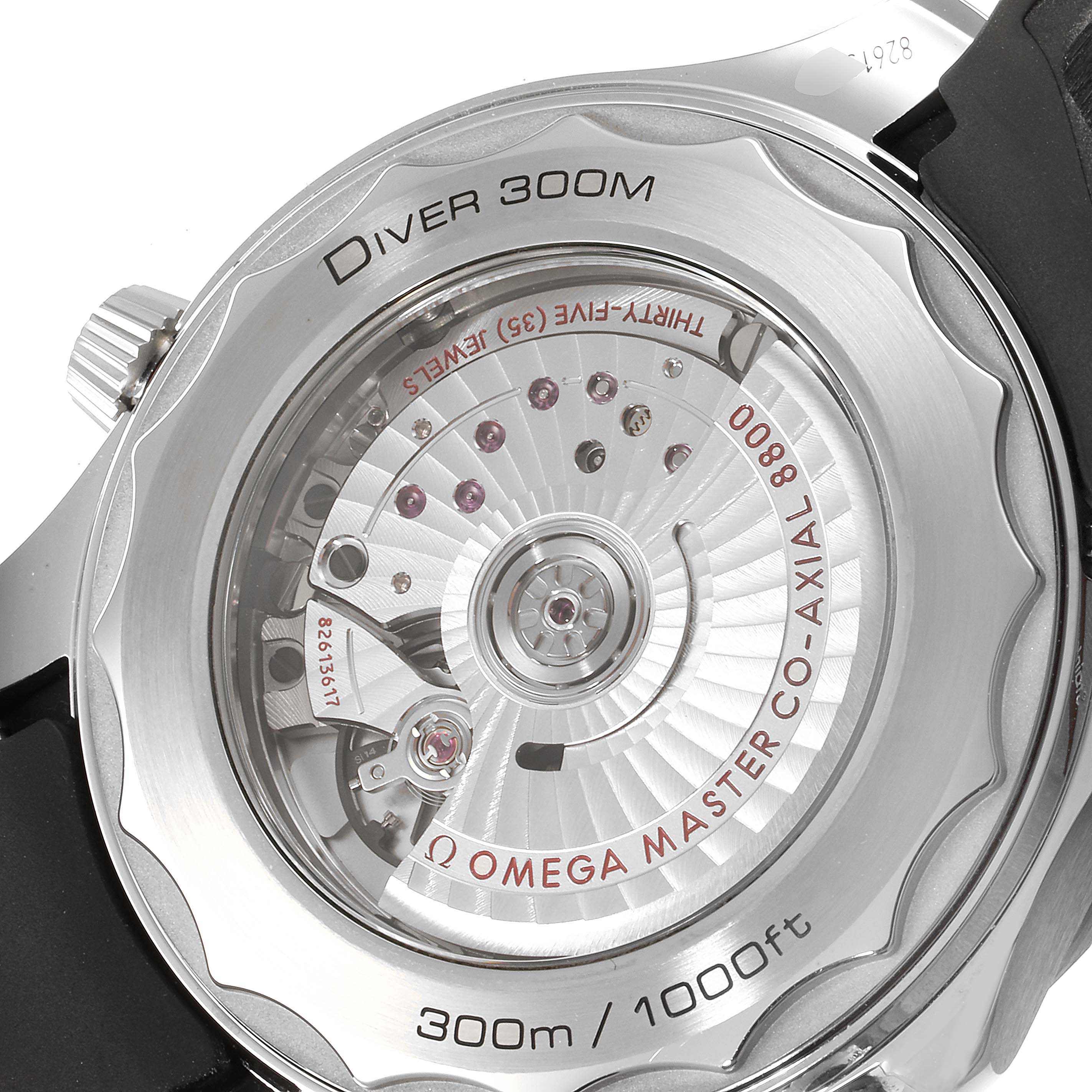 The image shows the back of an Omega Seamaster 210.32.42.20.01.001 Men's Stainless Steel Black Dial 210.32.42.20.01.001 Men's Stainless Steel Black Dial watch, highlighting the movement and engraving details.