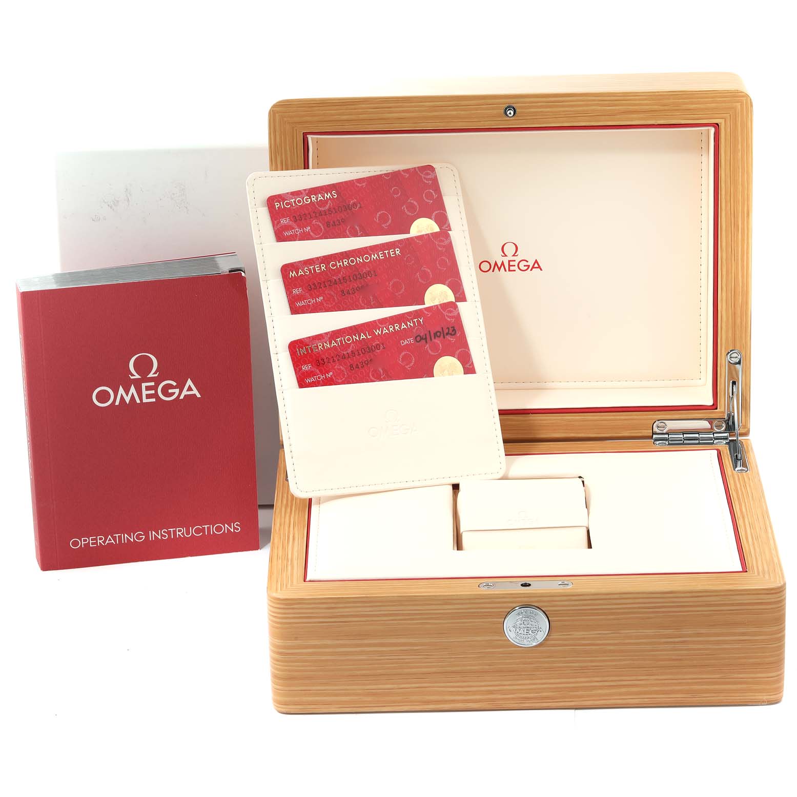 The image shows the packaging and accessories for the Omega Speedmaster 332.12.41.51.03.001 Men
s Stainless Steel Blue Dial 332.12.41.51.03.001 Men
s Stainless Steel Blue Dial, including the box, warranty cards, and operating instructions.