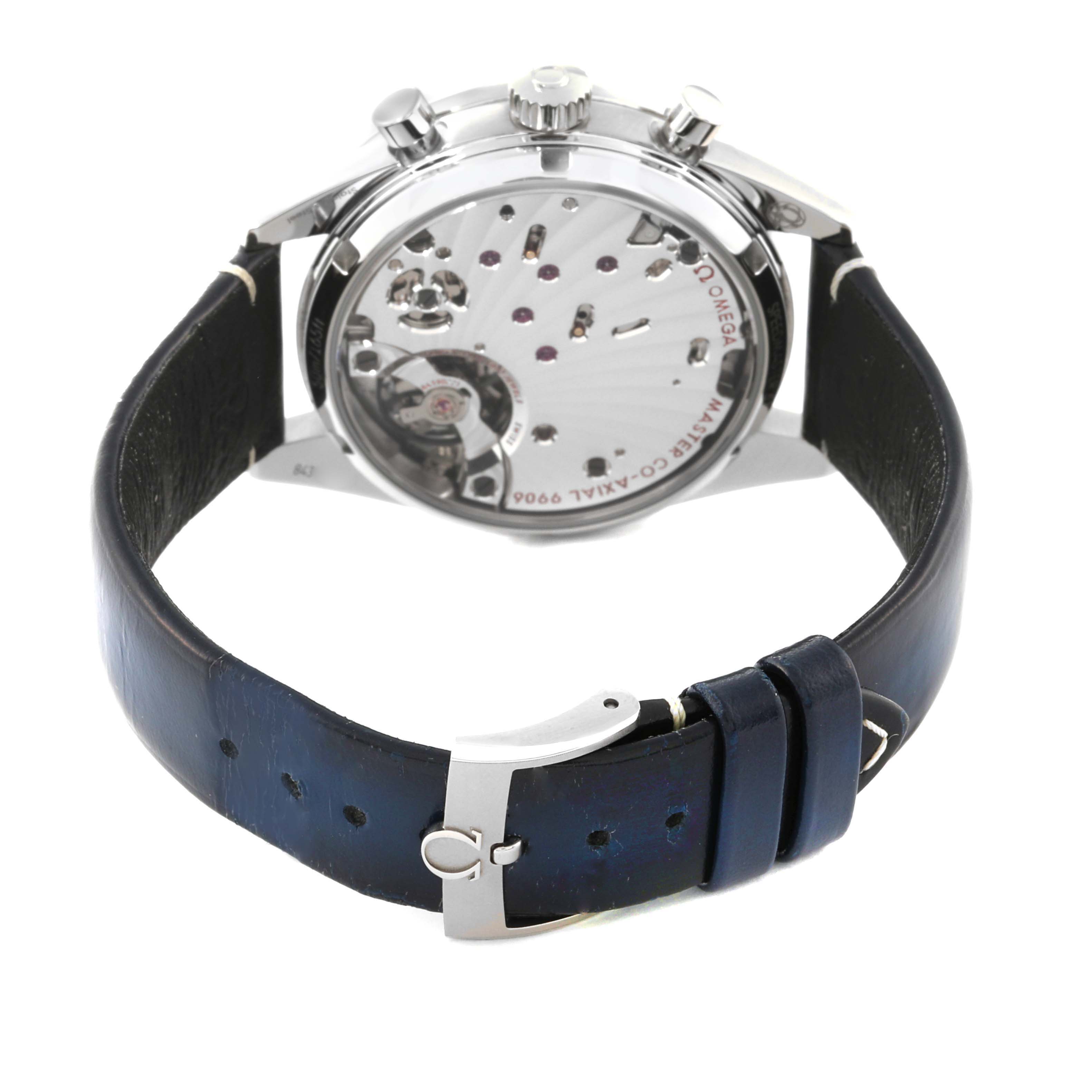This image shows the back view of an Omega Speedmaster 332.12.41.51.03.001 Men
s Stainless Steel Blue Dial 332.12.41.51.03.001 Men
s Stainless Steel Blue Dial watch, displaying its movement and leather strap with buckle.