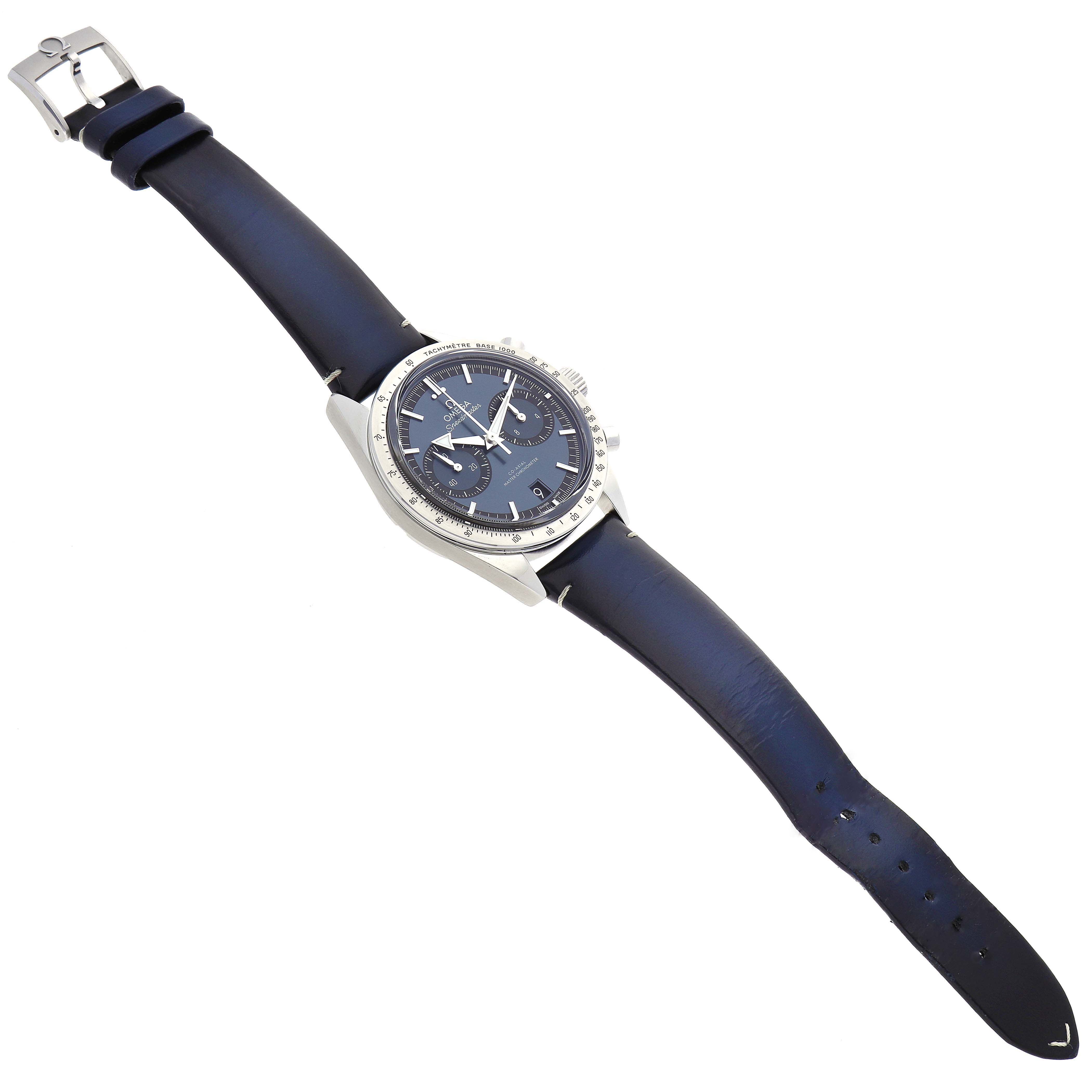 The image shows an Omega Speedmaster 332.12.41.51.03.001 Men
s Stainless Steel Blue Dial 332.12.41.51.03.001 Men
s Stainless Steel Blue Dial watch viewed from an angled top perspective displaying its full face and leather strap.