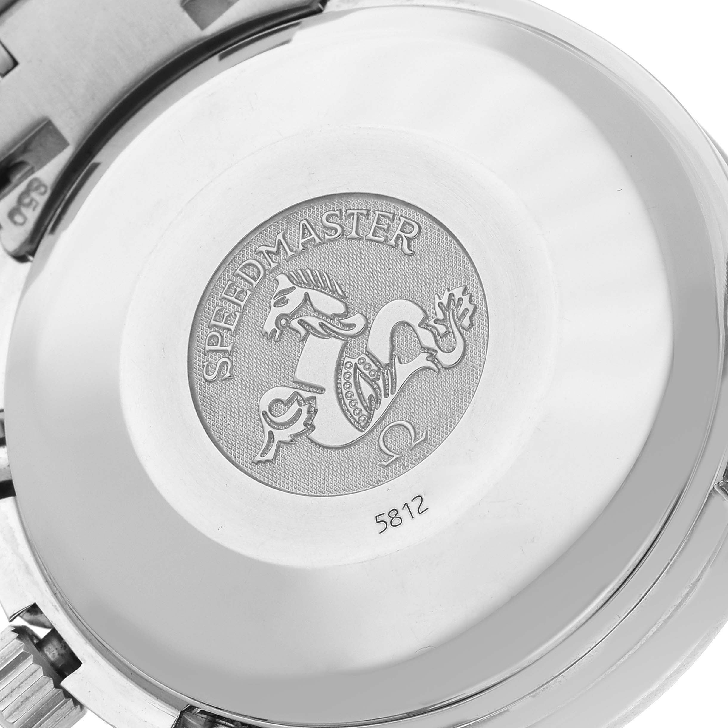 The image shows the back of an Omega Speedmaster 3513.30.00 Men
s Stainless Steel Silver Dial 3513.30.00 Men
s Stainless Steel Silver Dial watch, featuring an engraved emblem and model number.