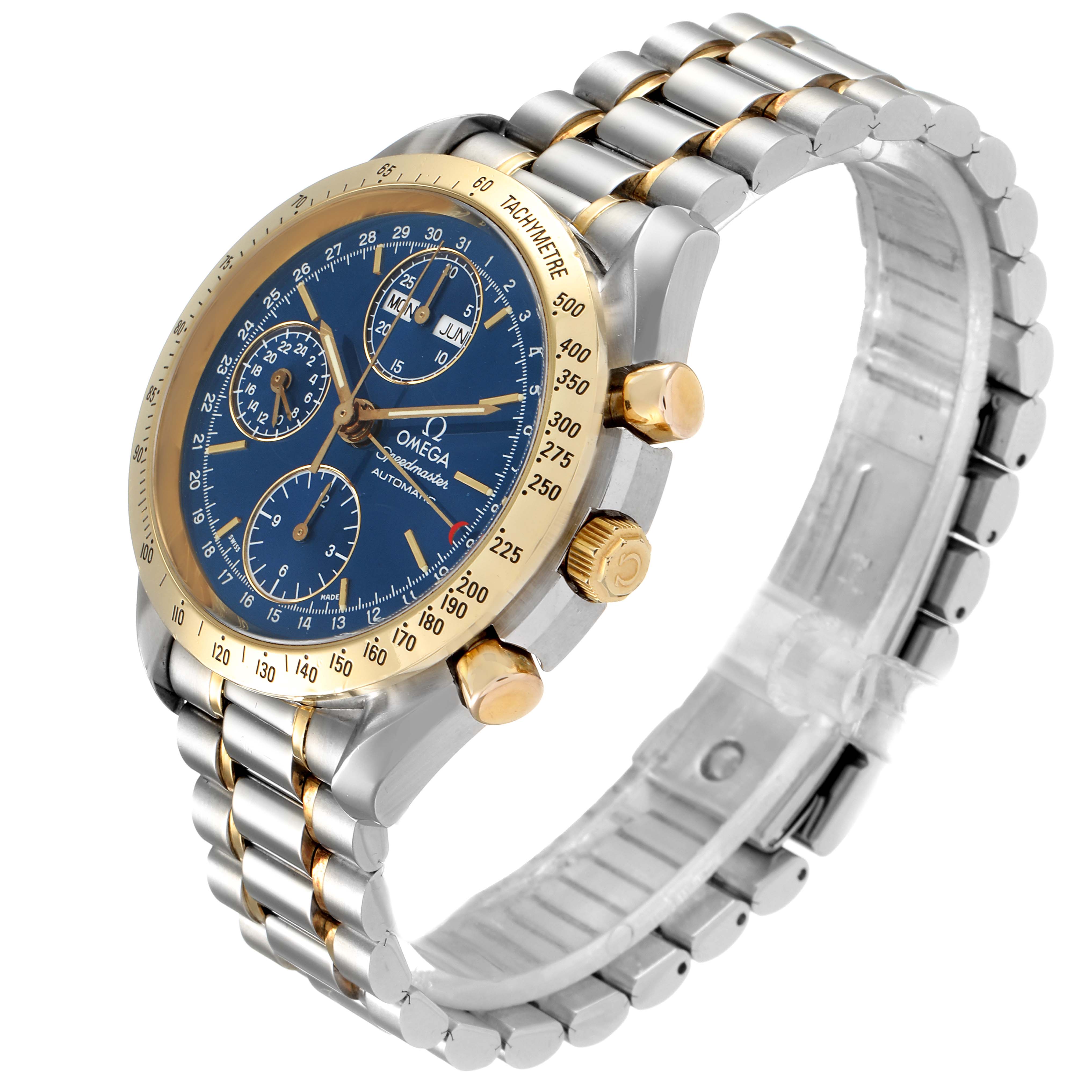 The Omega Speedmaster 3321.80.00 Men's Steel and Gold (two tone) Blue Dial 3321.80.00 Men's Steel and Gold (two tone) Blue Dial watch is shown at a slight angle, highlighting its blue dial, gold tachymeter bezel, and two-tone bracelet.