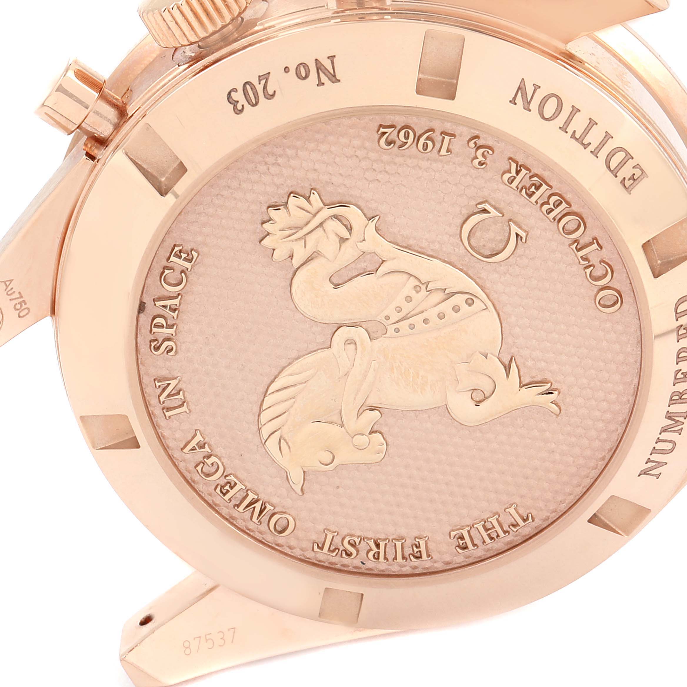 The image shows the reverse side of an Omega Speedmaster 311.63.40.30.02.001 Men's Rose Gold Silver Dial 311.63.40.30.02.001 Men's Rose Gold Silver Dial watch, displaying the engraved case back detailing.