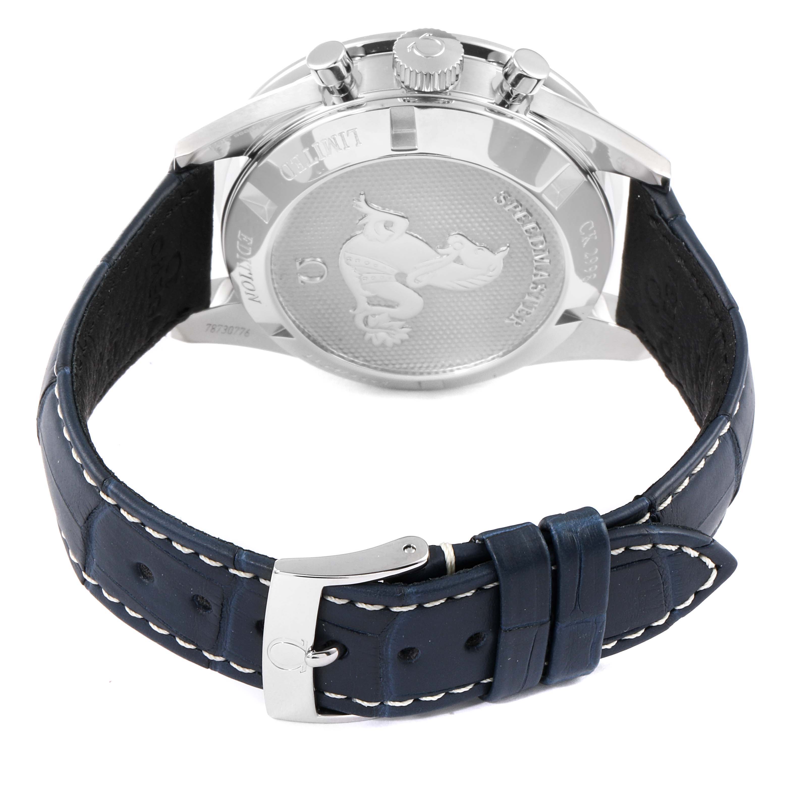 This image shows the back of an Omega Speedmaster 311.33.40.30.02.001 Men's Stainless Steel Silver Dial 311.33.40.30.02.001 Men's Stainless Steel Silver Dial watch and its blue leather strap with a silver buckle.