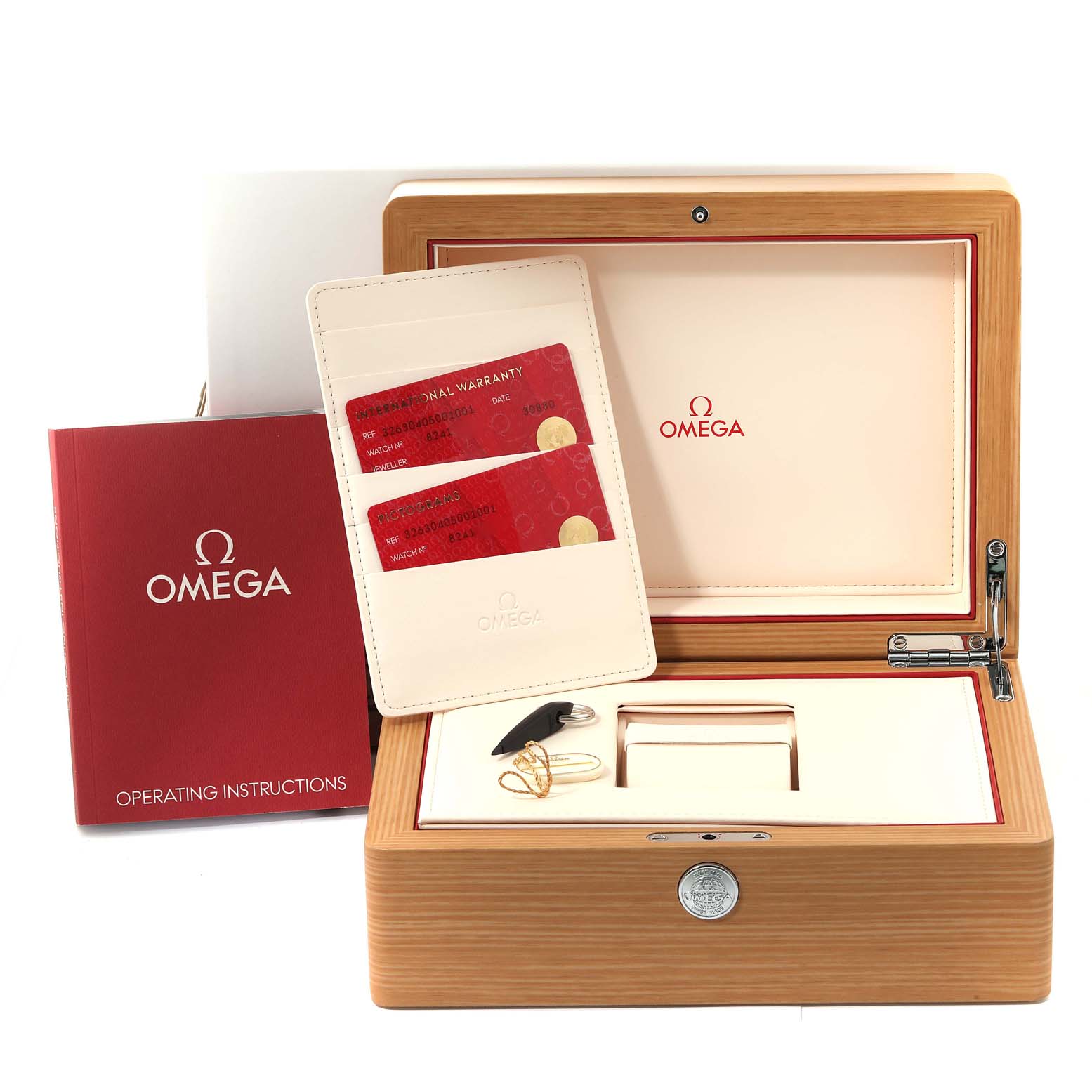 The image shows the packaging, warranty cards, and accessories for an Omega Speedmaster 326.30.40.50.01.001 Men
s Stainless Steel Black Dial 326.30.40.50.01.001 Men
s Stainless Steel Black Dial watch.