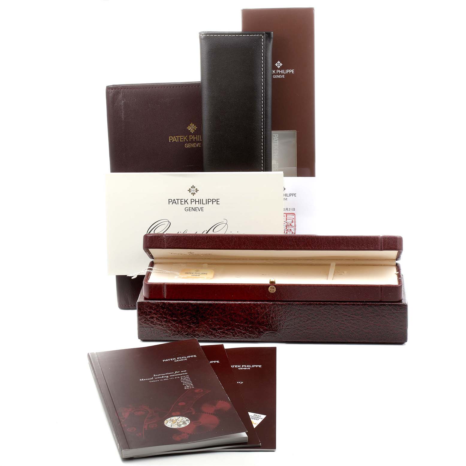 The image shows the packaging and documentation for a Patek Philippe Calatrava 4860G Women's White Gold White Dial 4860G Women's White Gold White Dial watch, including the box, manuals, and certificates.