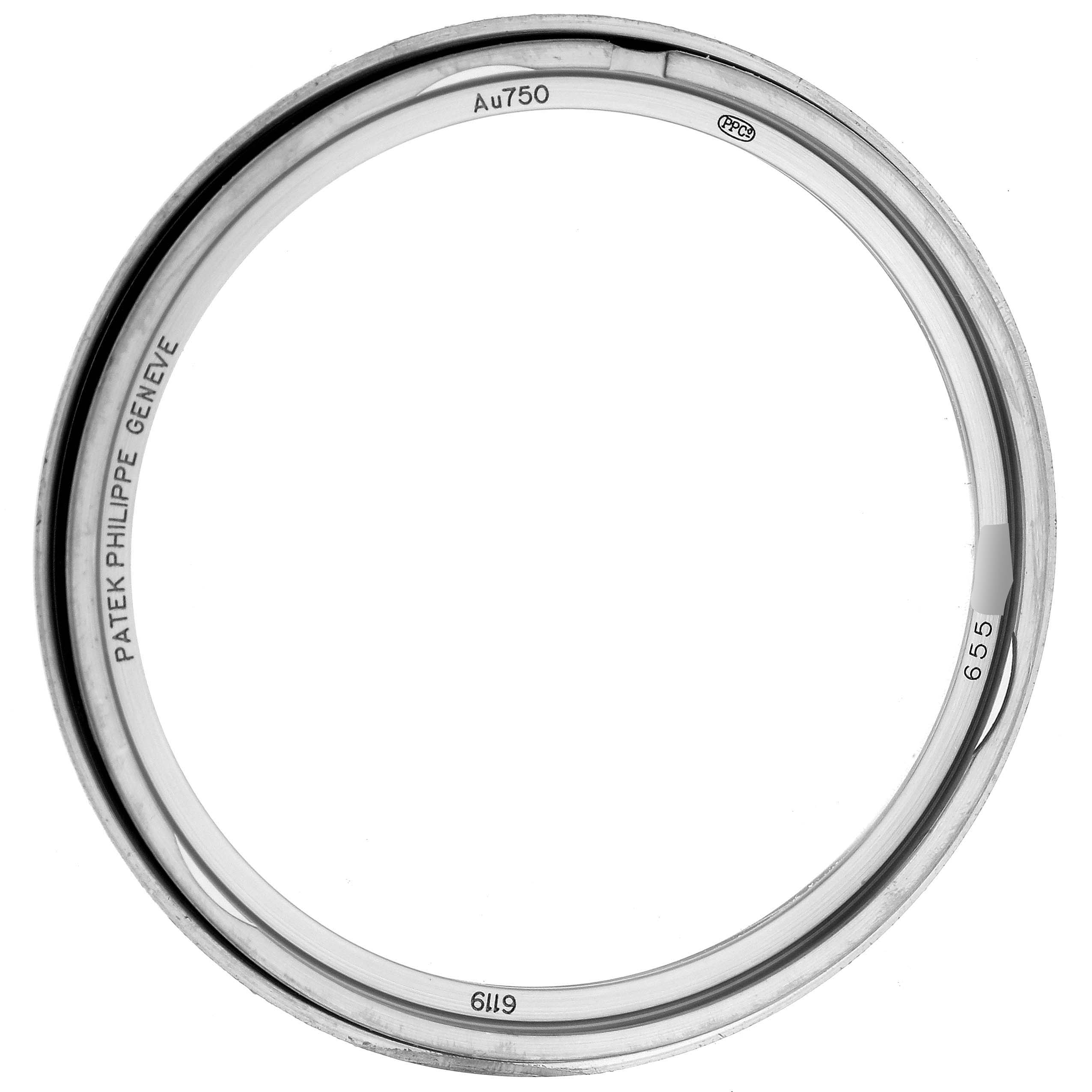 The image shows a close-up of the bezel for a Patek Philippe Calatrava 6119 Men's White Gold Grey Dial 6119 Men's White Gold Grey Dial watch, viewed from above.