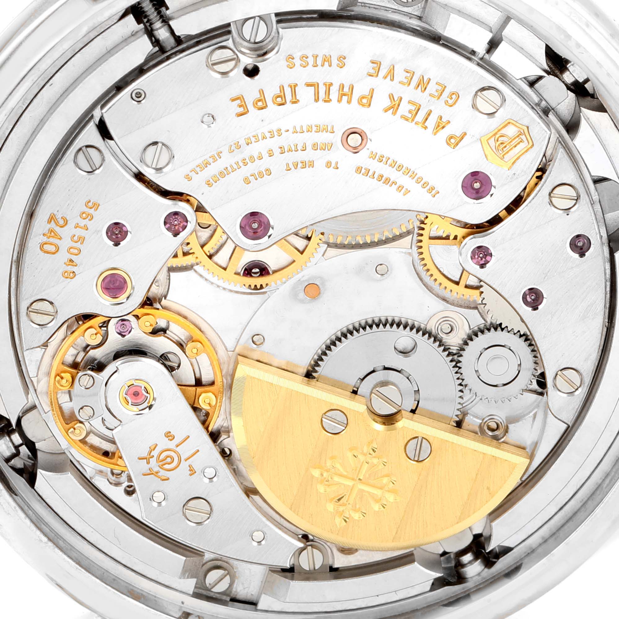 This image shows the intricate movement and mechanism of the Patek Philippe Calatrava 5140G-001 Men's White Gold Silver Dial 5140G-001 Men's White Gold Silver Dial watch from a close-up, internal view.