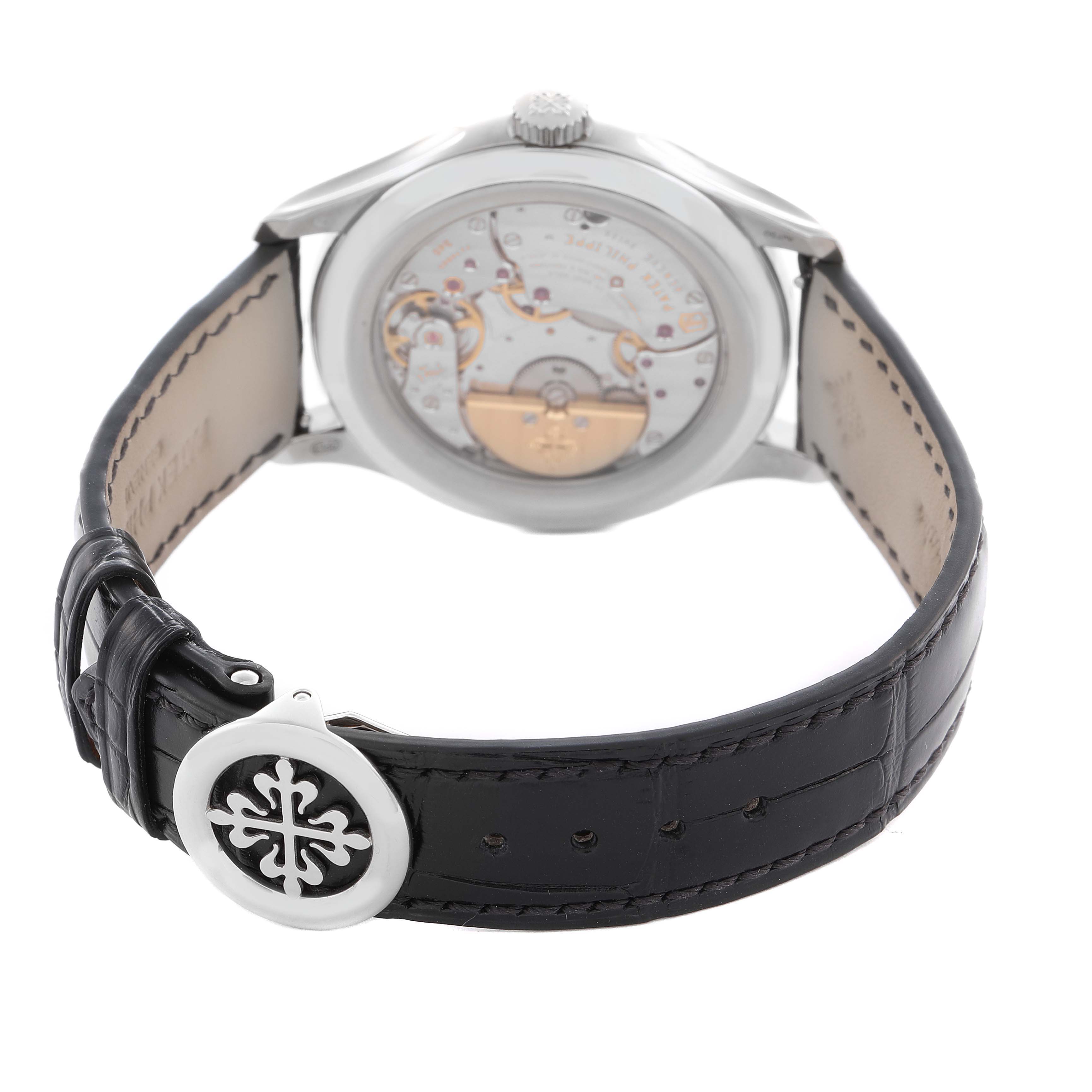 The Patek Philippe Complications 5327G-001 Men
s White Gold Blue Dial 5327G-001 Men
s White Gold Blue Dial watch is shown from the rear, highlighting its case back and black leather strap.