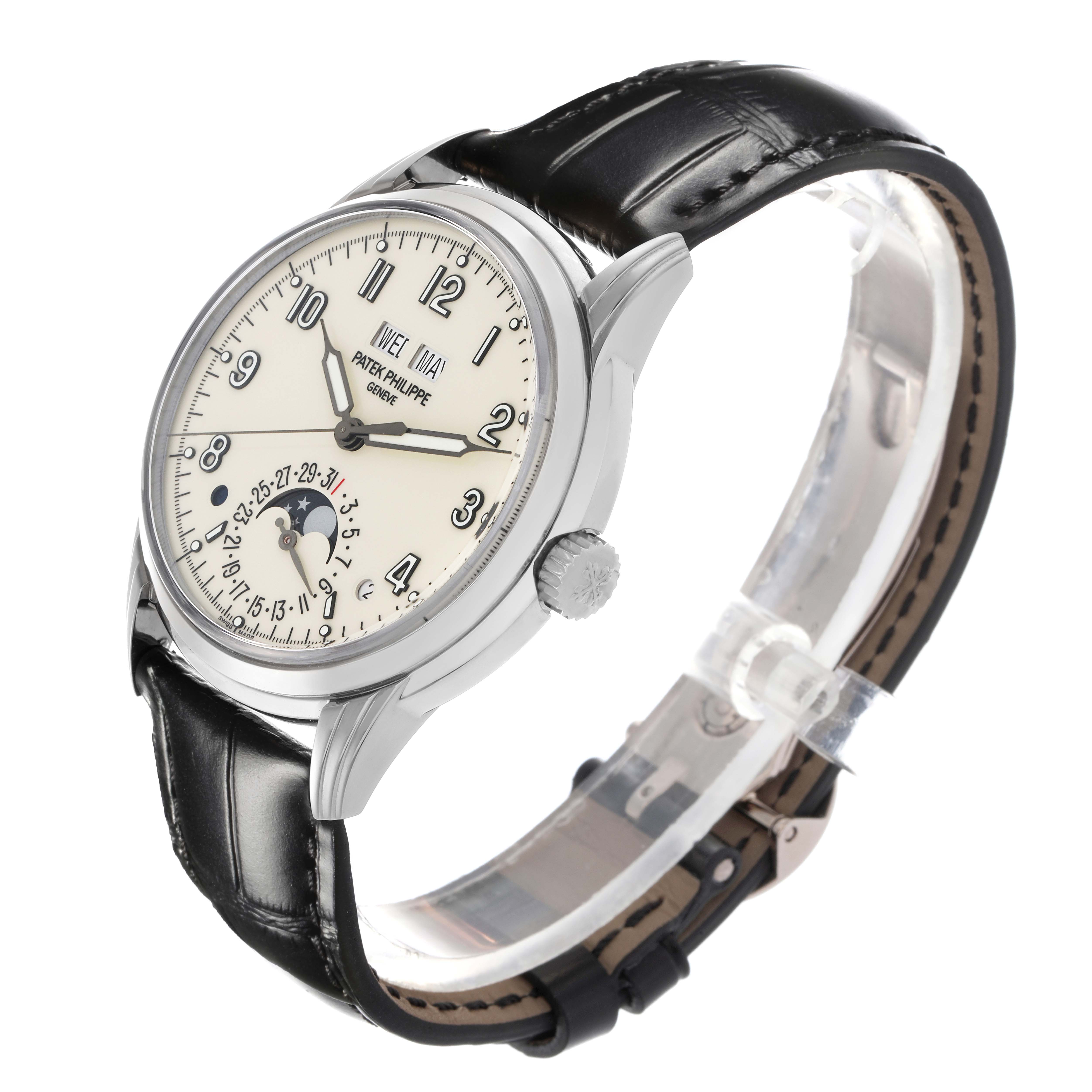 The Patek Philippe Complications 5320G-001 Men
s White Gold White Dial 5320G-001 Men
s White Gold White Dial watch is shown at a three-quarter angle, highlighting the face, crown, and leather strap.
