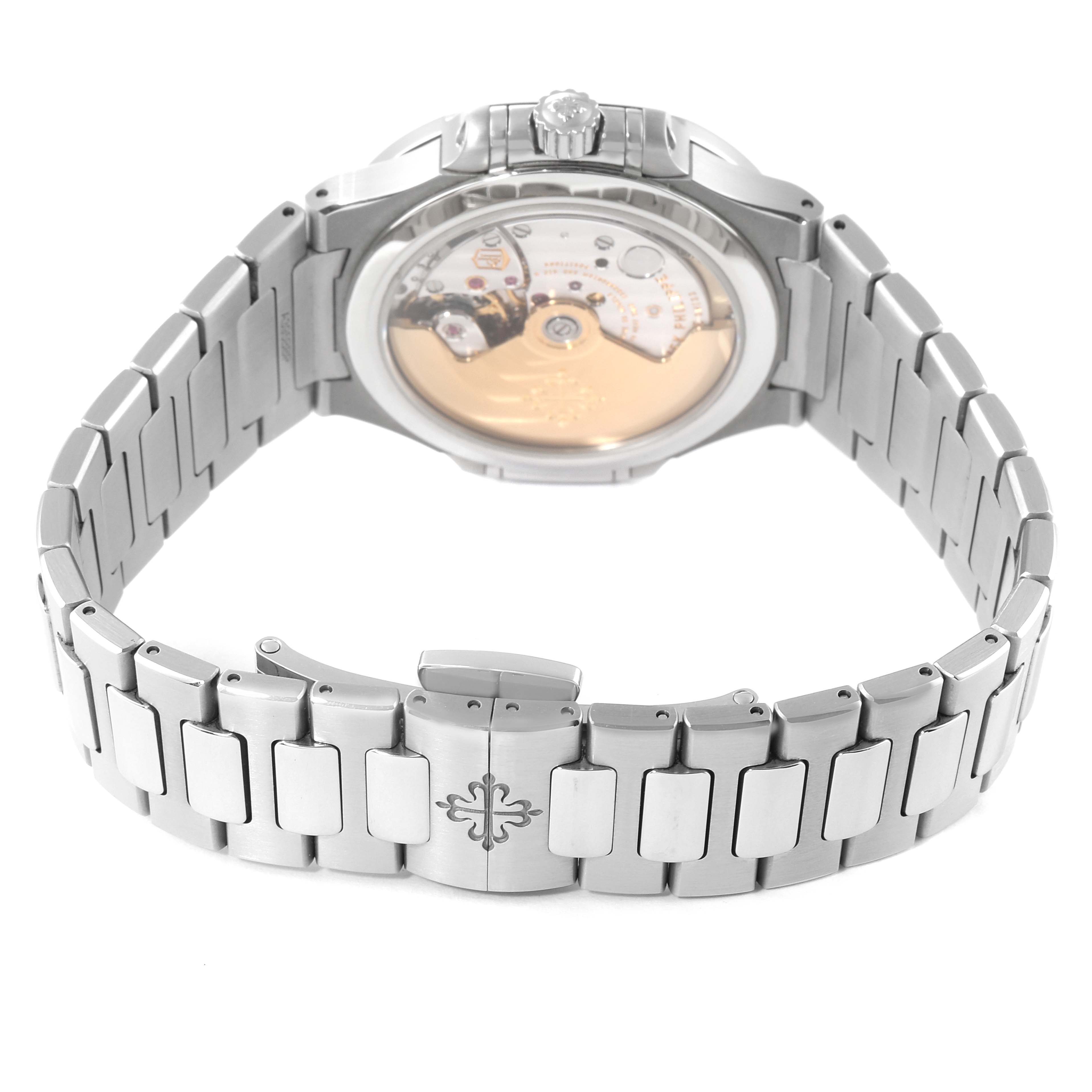 The image shows the back view of a Patek Philippe Nautilus 7118/1A -010 Men's Stainless Steel Silver Dial 7118/1A -010 Men's Stainless Steel Silver Dial watch, featuring its stainless steel bracelet and clear case back.