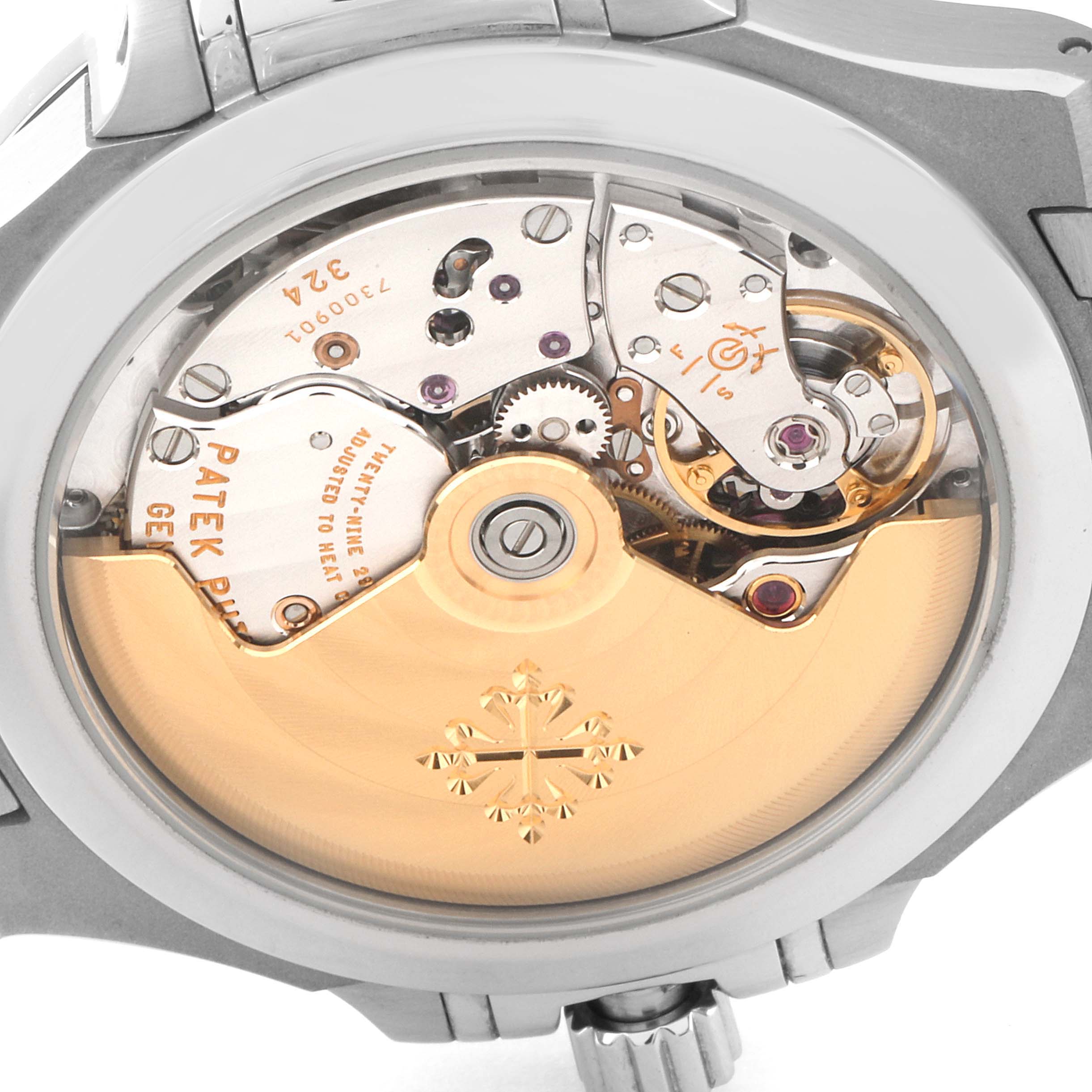 The image shows the back view of a Patek Philippe Nautilus 7118/1A -010 Men's Stainless Steel Silver Dial 7118/1A -010 Men's Stainless Steel Silver Dial watch, highlighting its exposed movement and rotor.