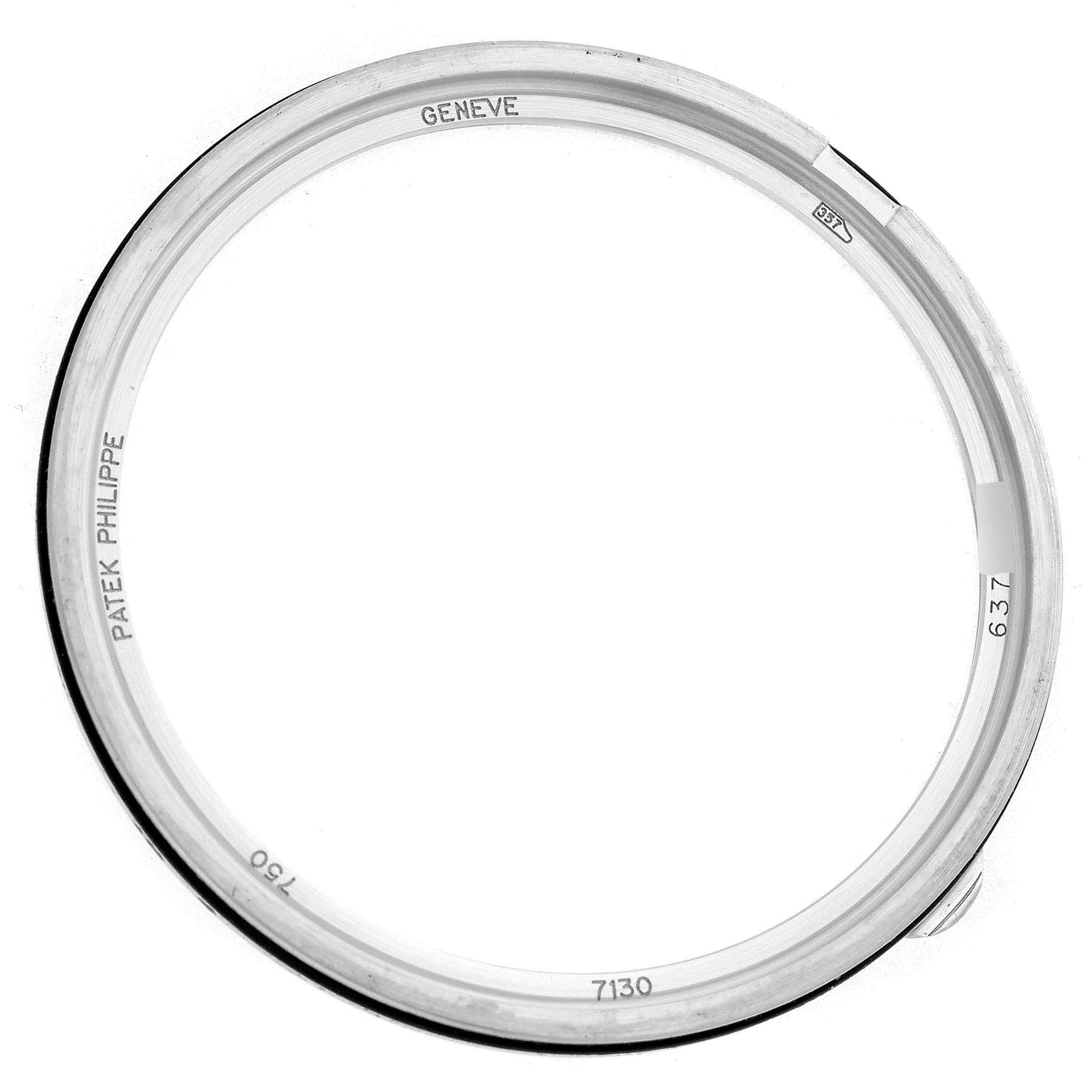 The image shows a top-down view of a bezel from a Patek Philippe Complications 7130G-016 Men
s White Gold Blue Dial 7130G-016 Men
s White Gold Blue Dial model.