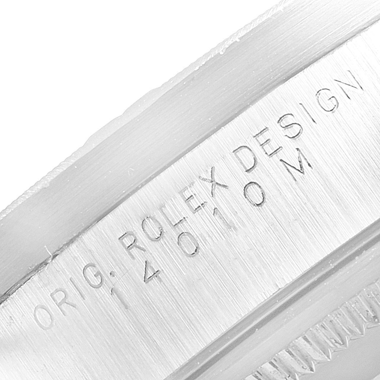 The image shows a close-up view of the engraved bezel on a Rolex Air-King 14010 Men's Stainless Steel Black Dial 14010 Men's Stainless Steel Black Dial model.