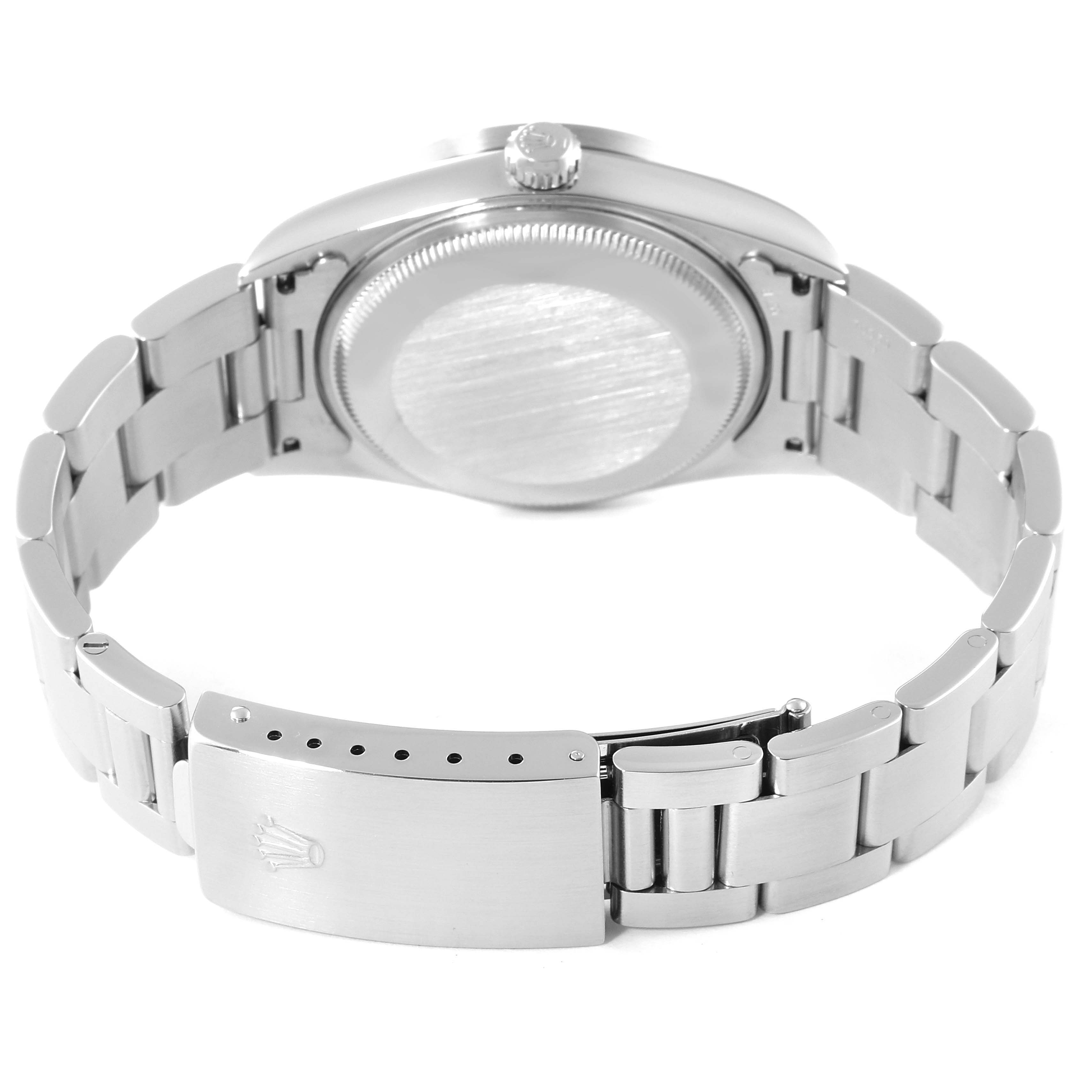 This image shows the back case and bracelet clasp of a Rolex Air-King 14010 Men's Stainless Steel Black Dial 14010 Men's Stainless Steel Black Dial watch from a rear angle.