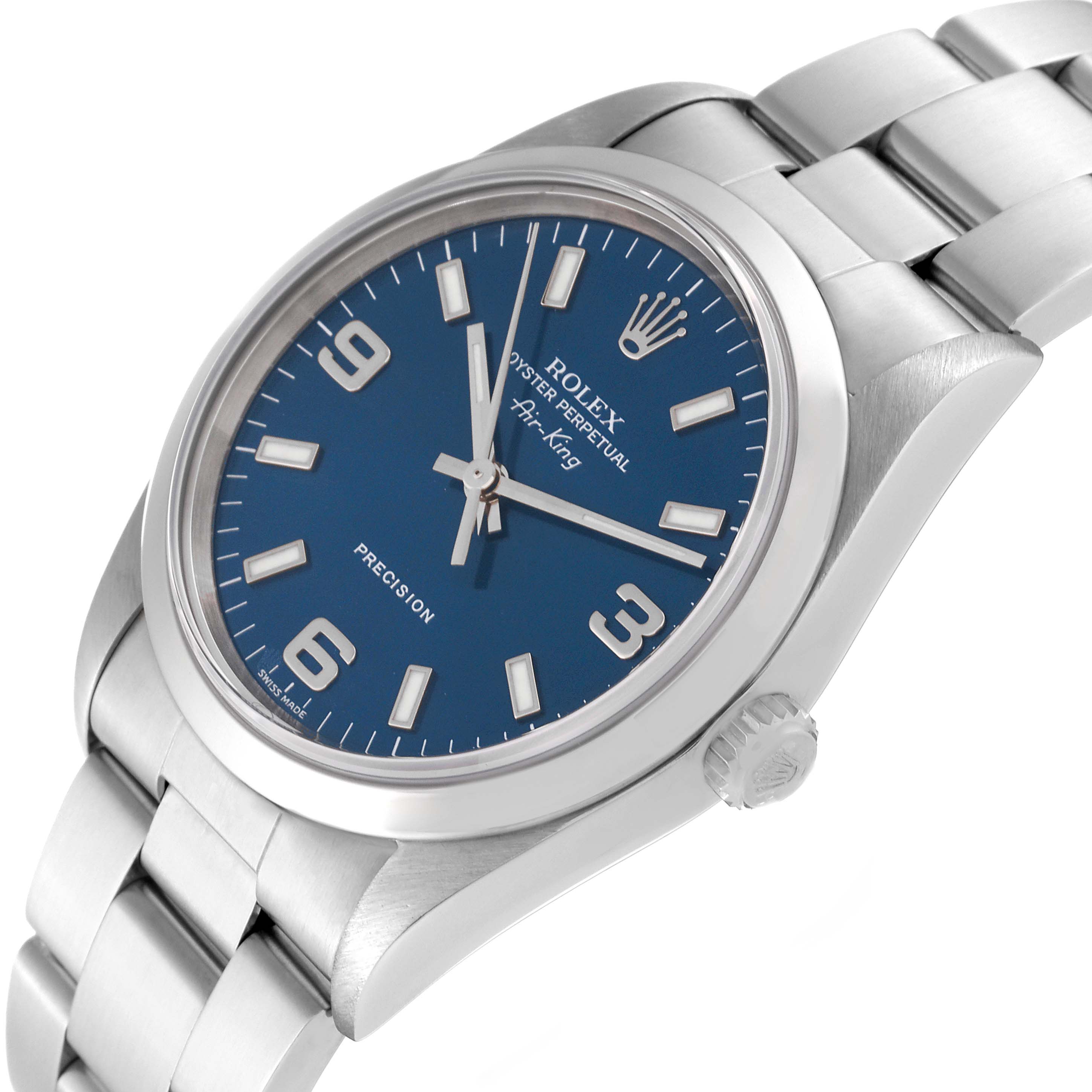 The image shows a Rolex Air-King 14000M Men's Stainless Steel Blue Dial 14000M Men's Stainless Steel Blue Dial watch at an angled view, highlighting the blue dial, case, crown, and part of the metal bracelet.