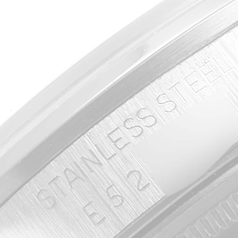 This close-up image shows the side view of the stainless steel case back of a Rolex Air-King 14000 Men's Stainless Steel Silver Dial 14000 Men's Stainless Steel Silver Dial watch.