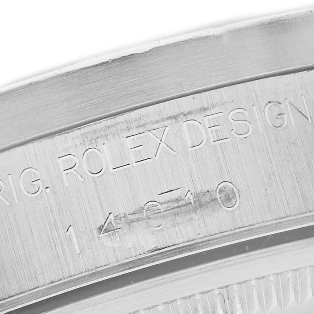 This close-up image shows the inner bezel with engravings of the Rolex Air-King 14010 Men's Stainless Steel White Dial 14010 Men's Stainless Steel White Dial watch model.