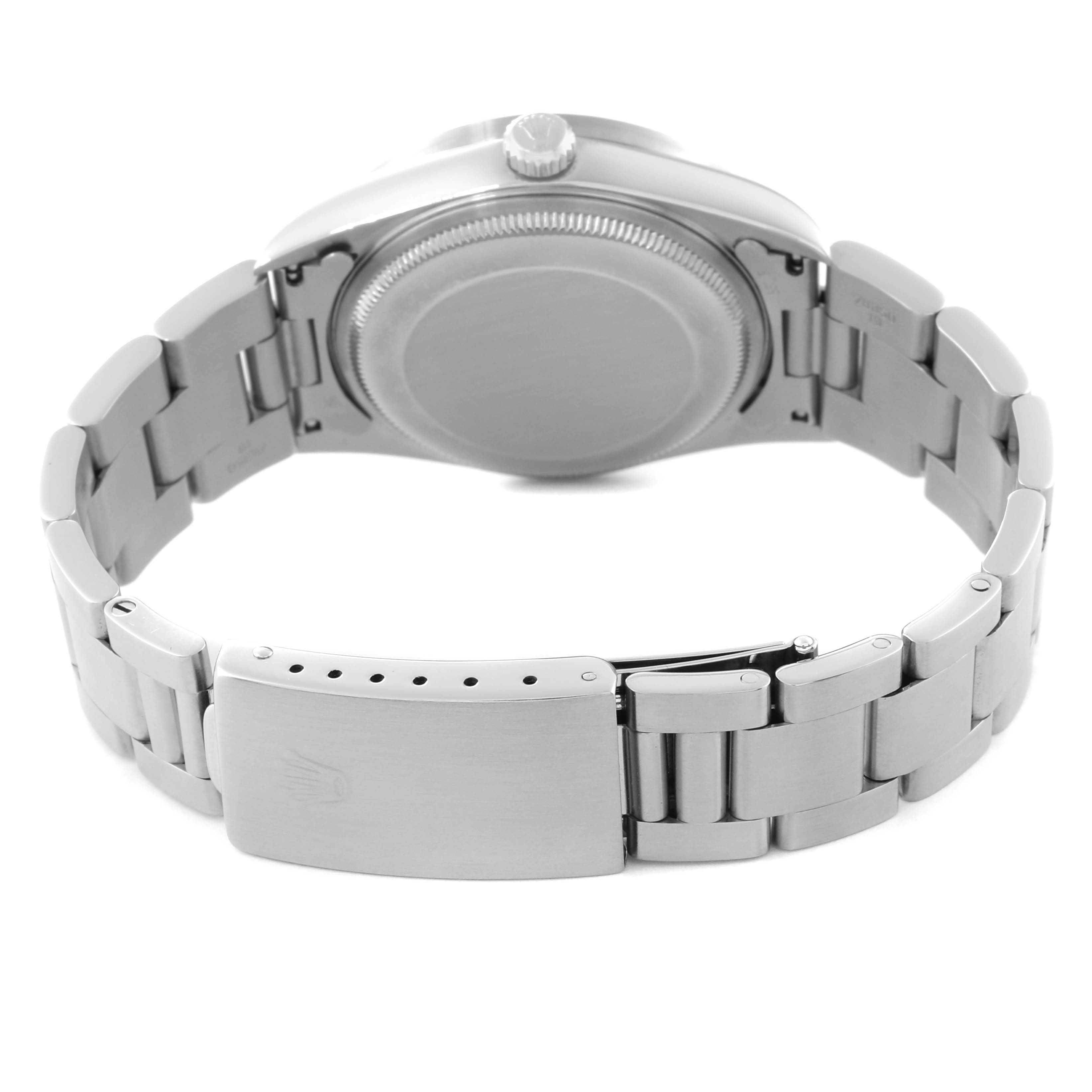 This image shows the back side of the Rolex Air-King 14010 Men's Stainless Steel Black Dial 14010 Men's Stainless Steel Black Dial watch, focusing on the closed clasp and metal bracelet.